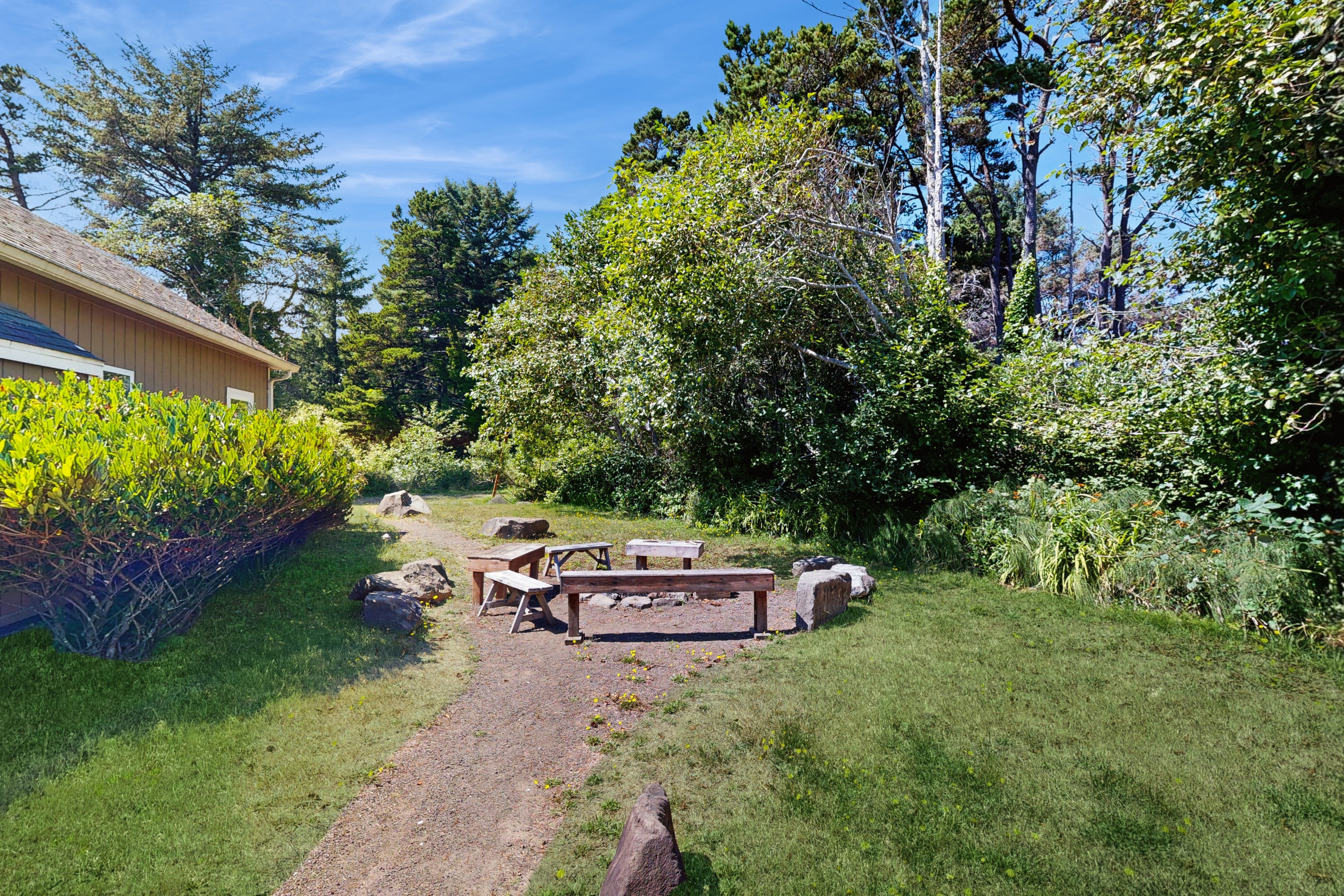 Expansive family friendly home with a private hot tub walk to the beach