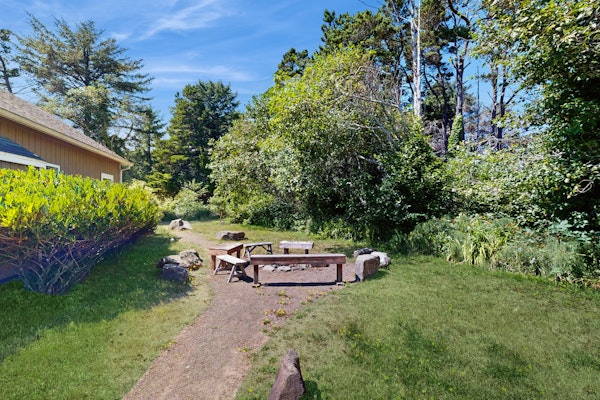 Expansive family friendly home with a private hot tub walk to the beach