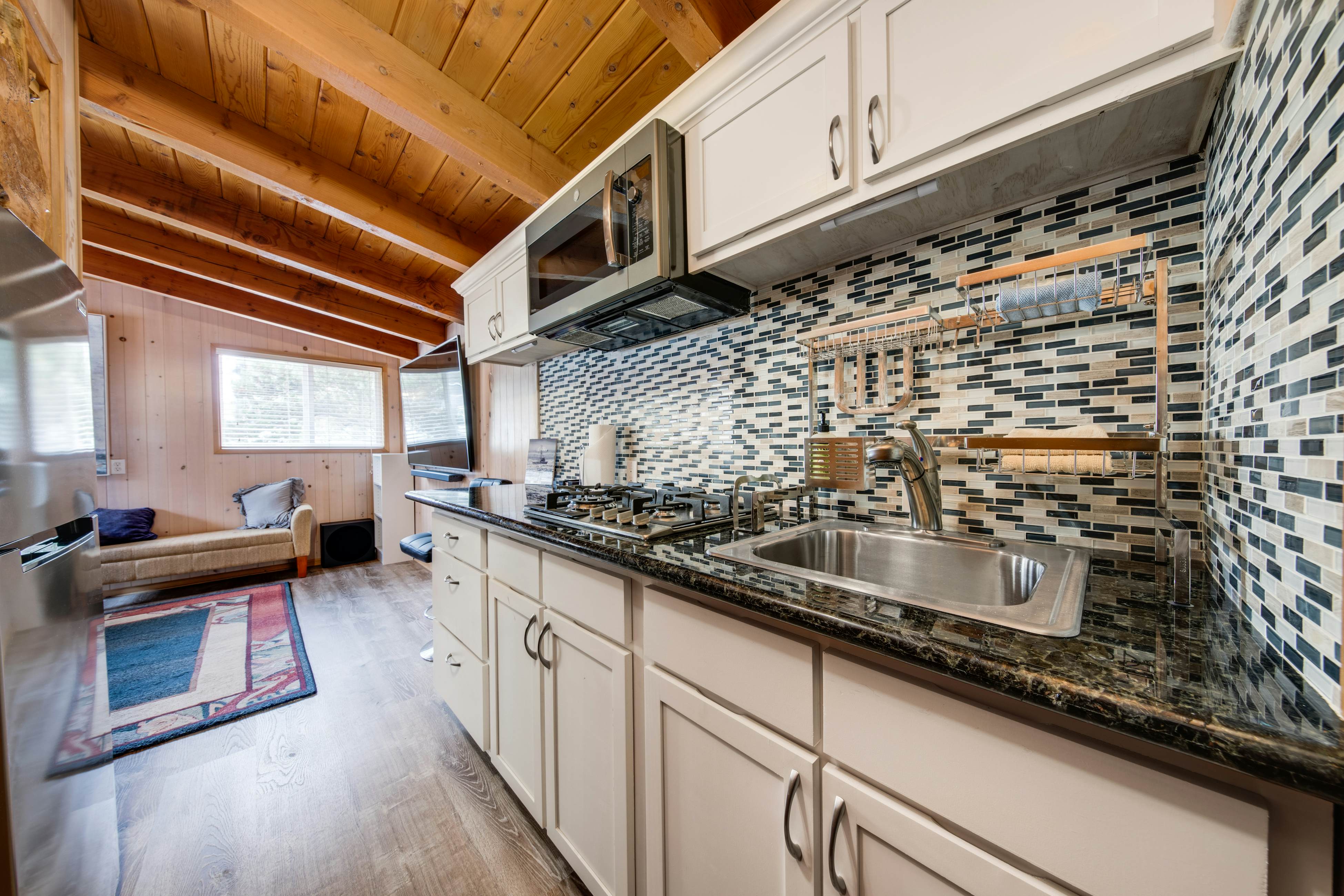 Snazzy home near the beach with private hot tub, patio & grill