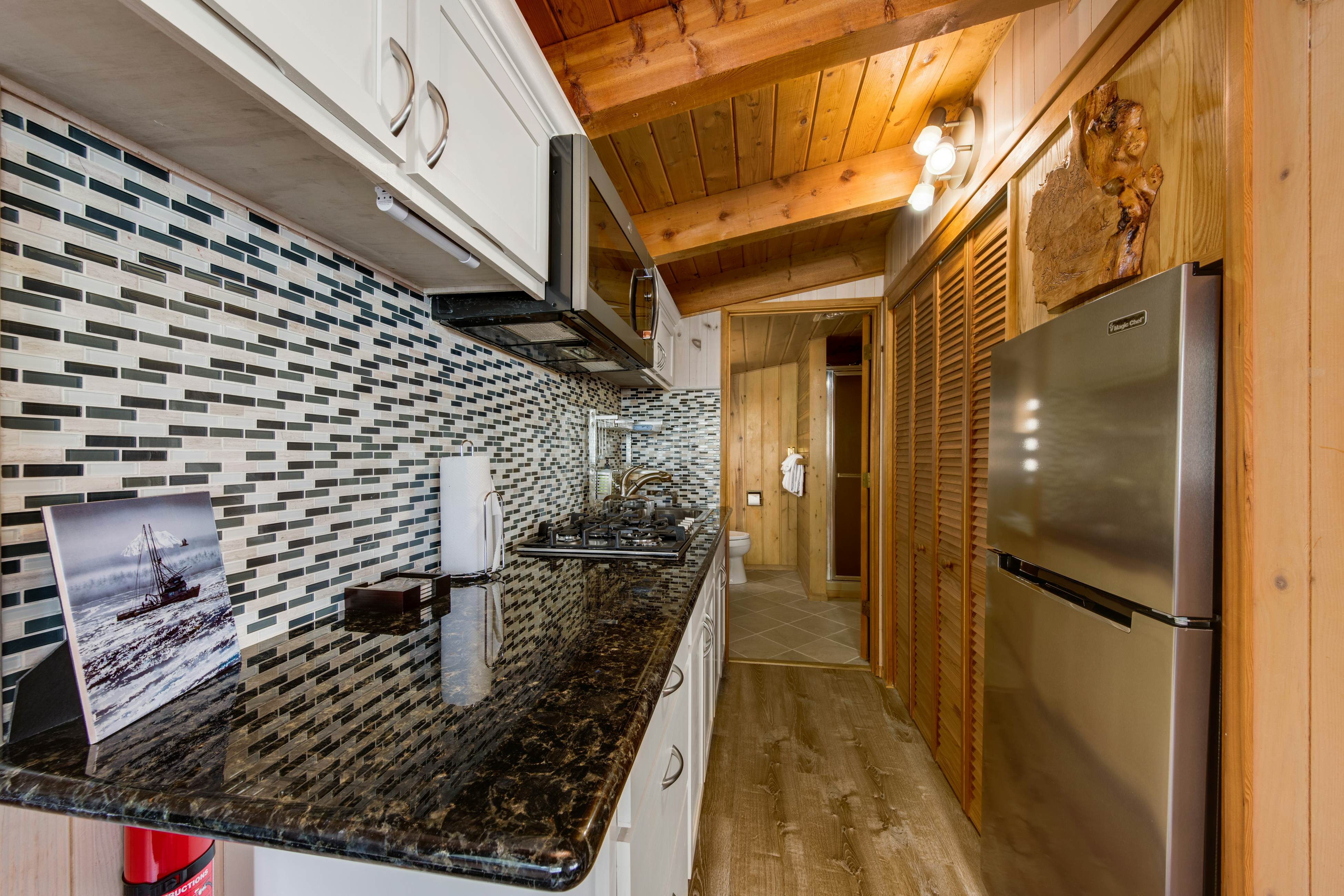 Snazzy home near the beach with private hot tub, patio & grill