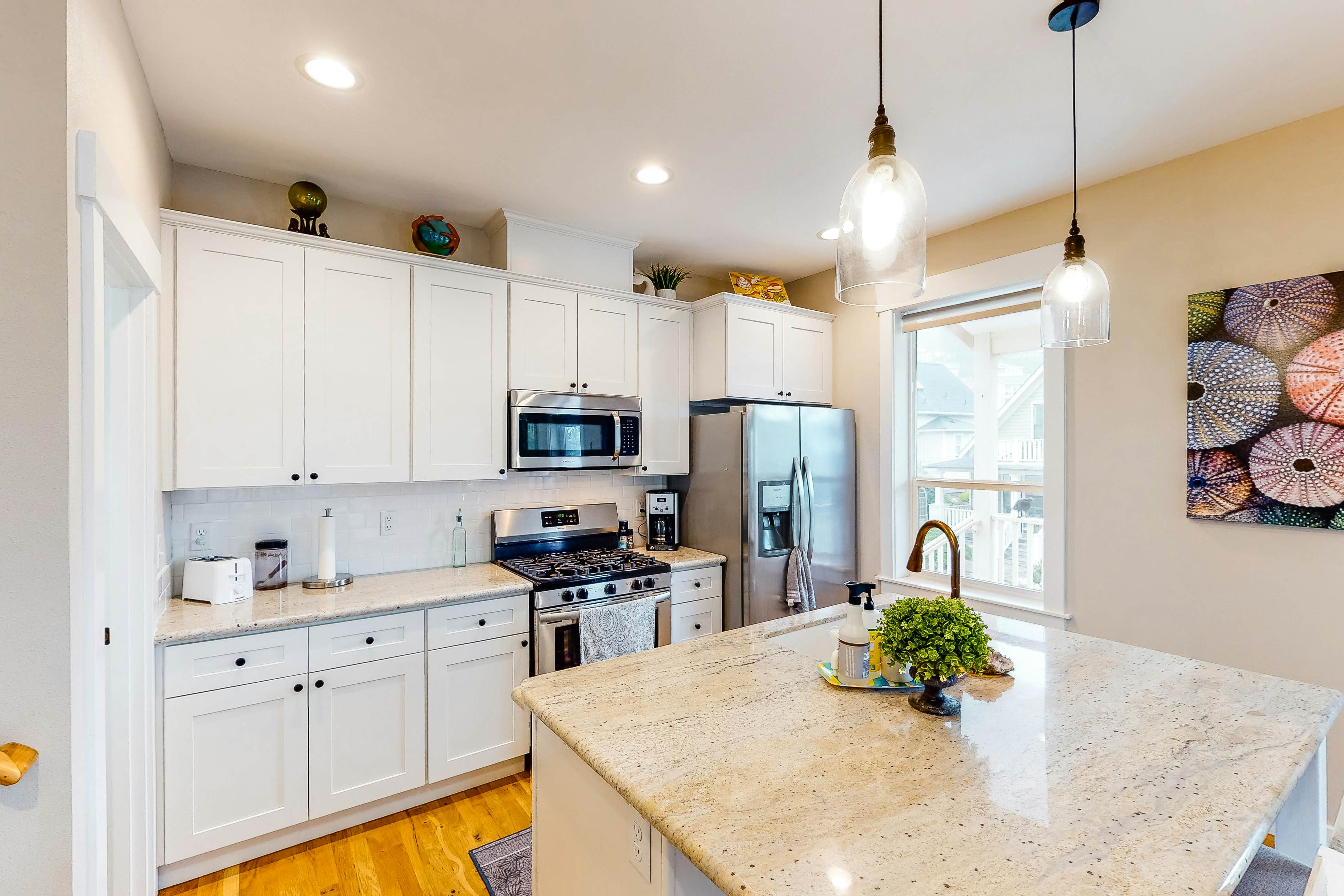 Charming, three-story getaway w/ two cozy living areas - walk to the beach