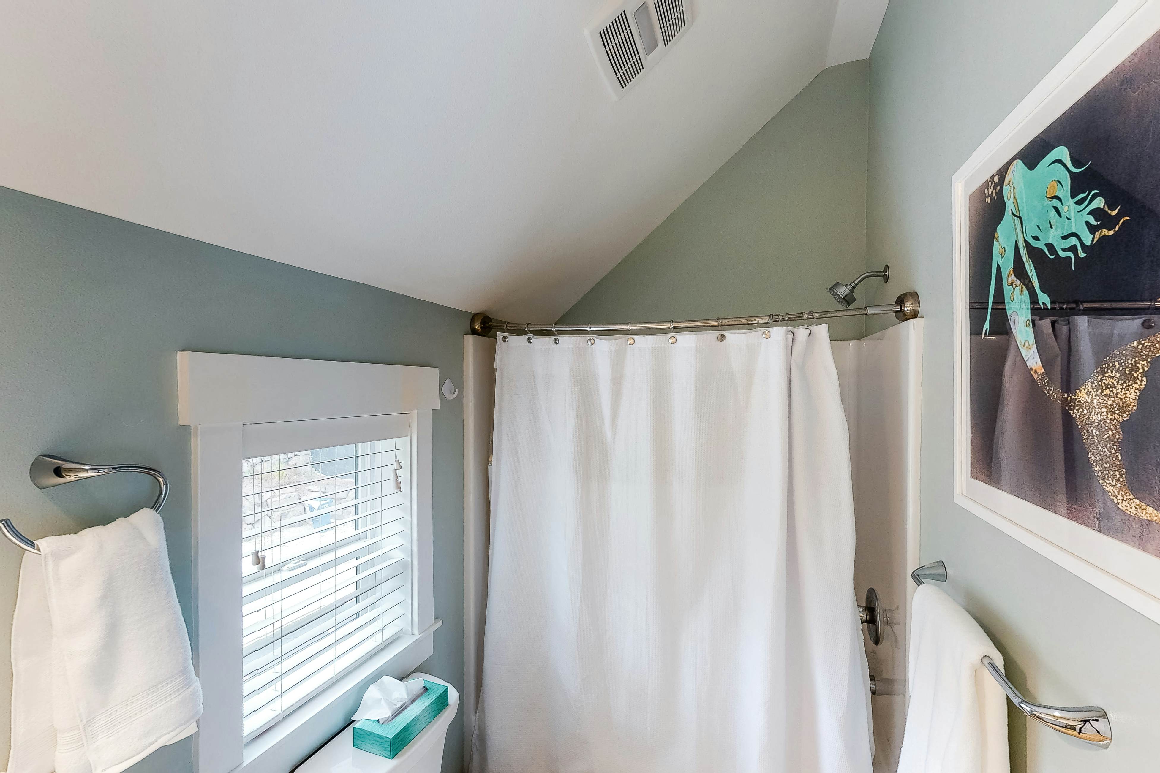 Charming, three-story getaway w/ two cozy living areas - walk to the beach