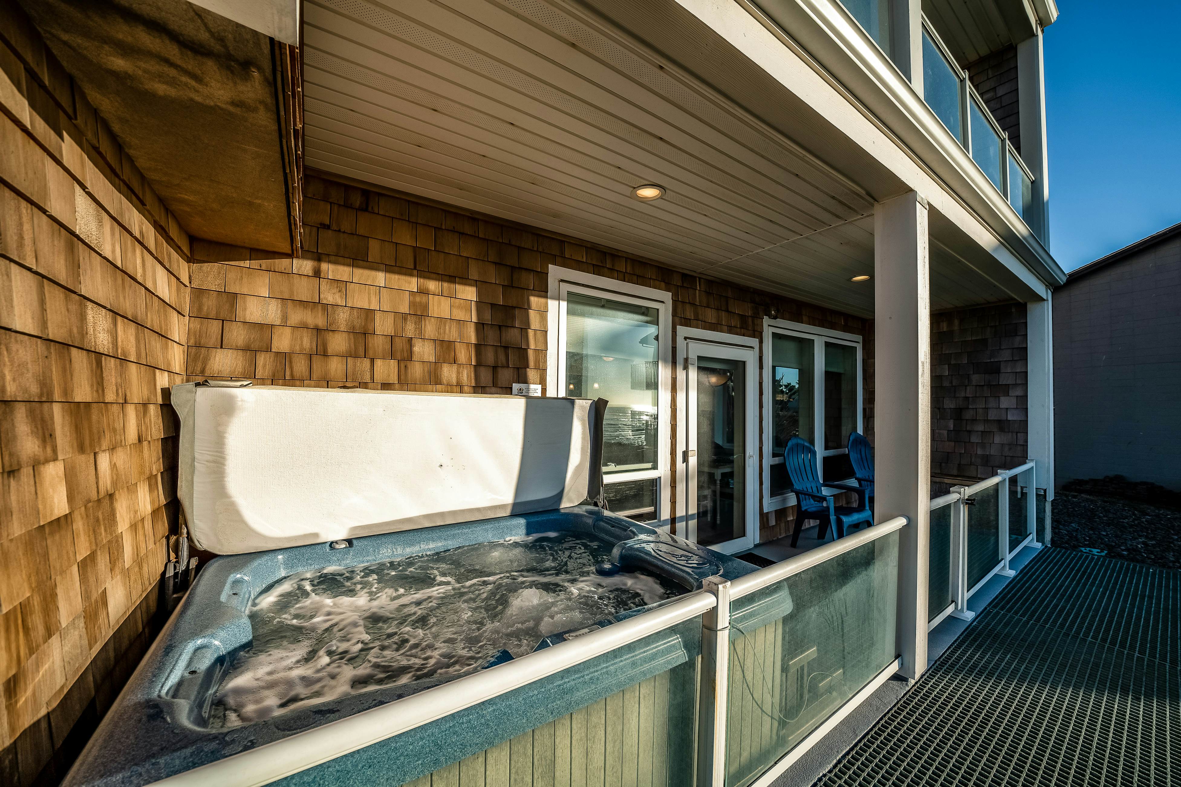 Oceanfront condo with private hot tub, ocean views, and high-speed WiFi