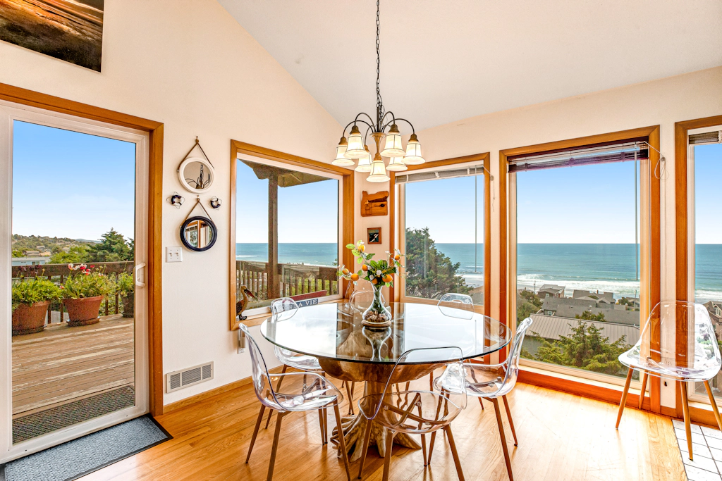 Limited Time Deals Coastal Hideaway with Ocean Views and Spacious Deck
