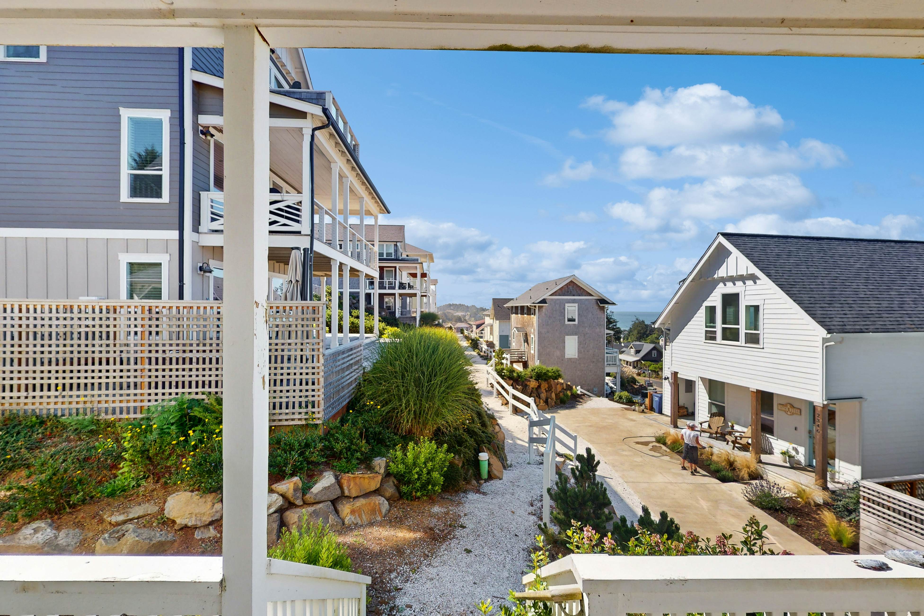 Ocean-view home with private hot tub, fireplaces, balcony - beach & pool access