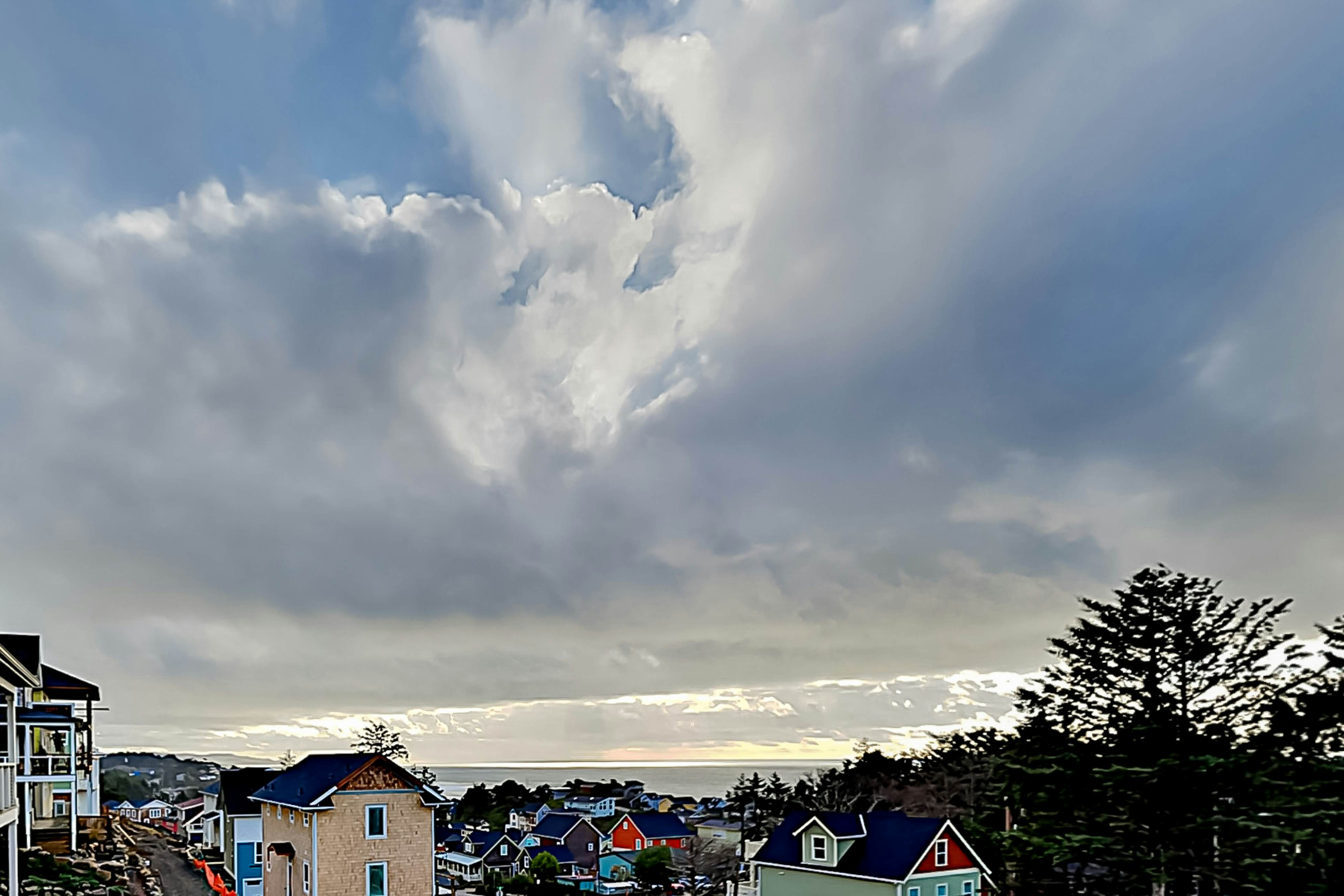 Ocean-view home with private hot tub, fireplaces, balcony - beach & pool access