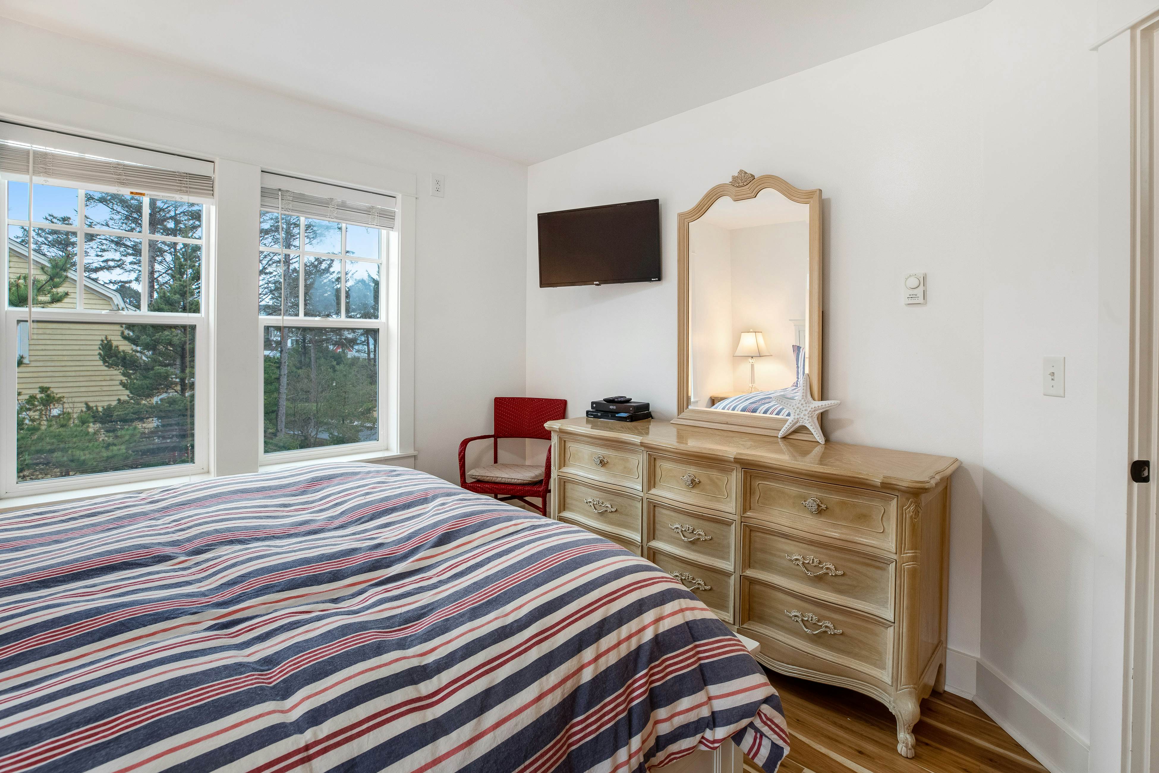 Dog-Friendly Beach House with Free WiFi, a Furnished Deck, Hot Tub, & Grill