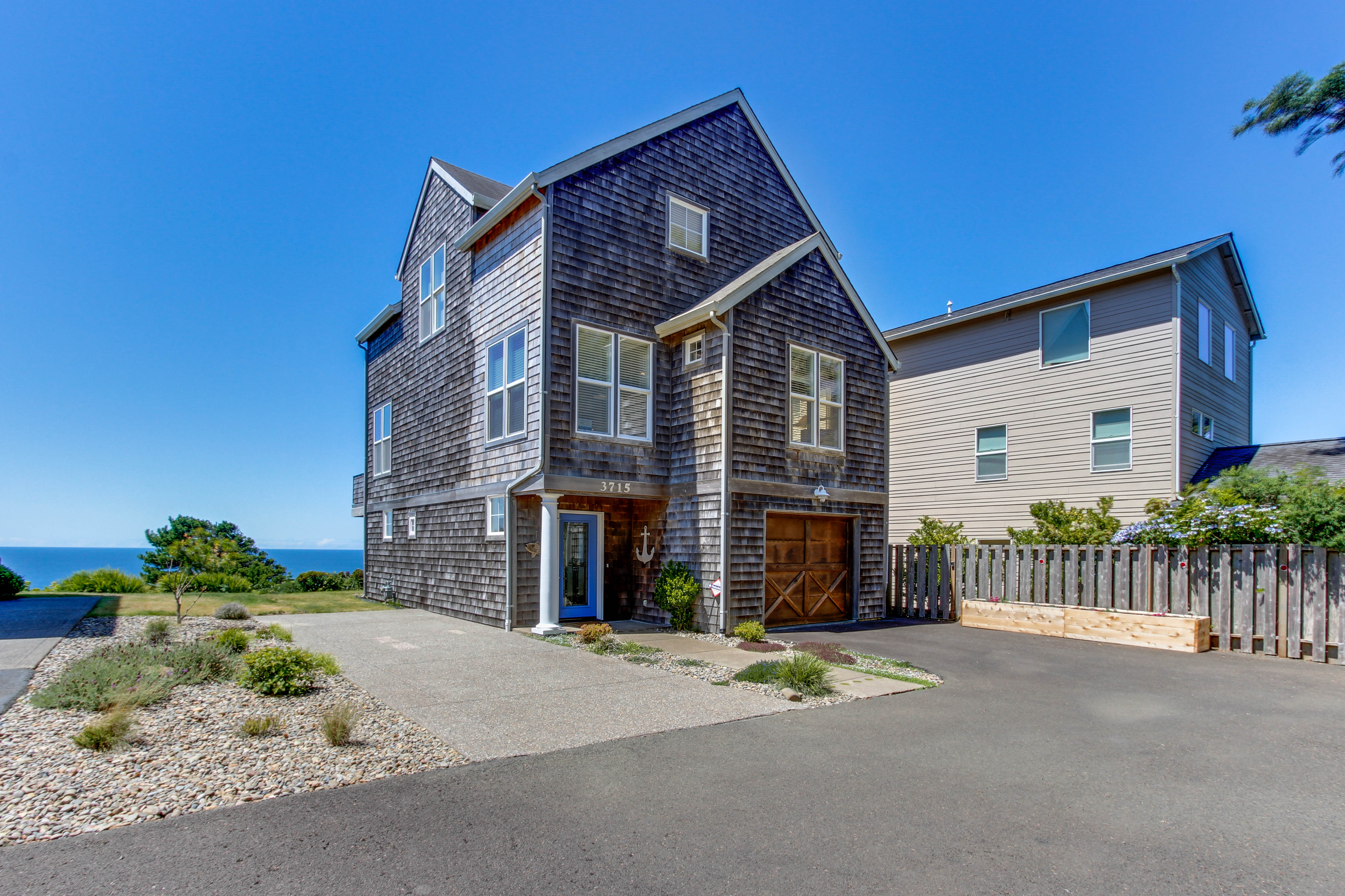 Pristine Home with Stunning Views Short Walk to Beach Right in Town