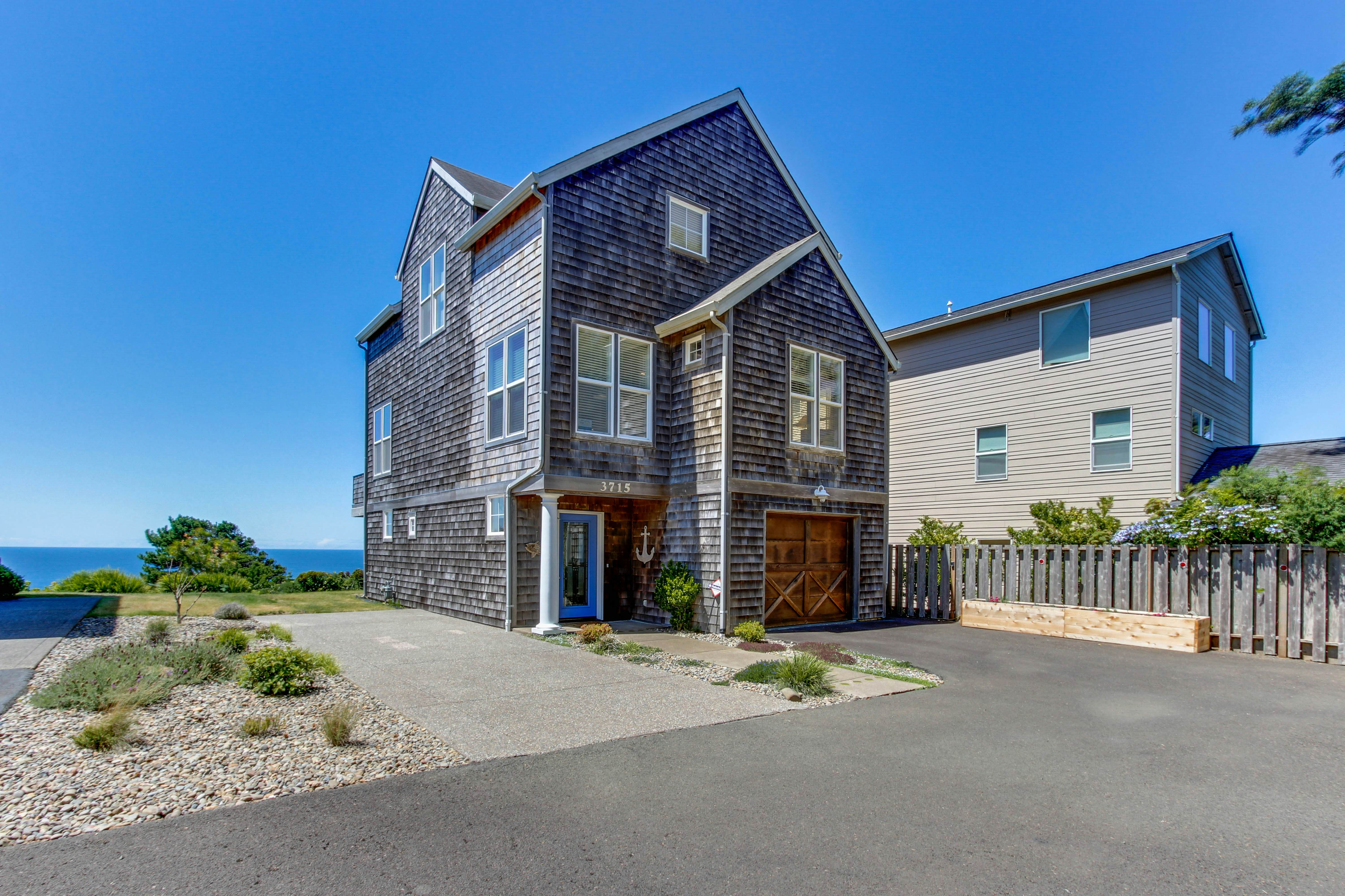 Pristine Home with Stunning Views Short Walk to Beach Right in Town