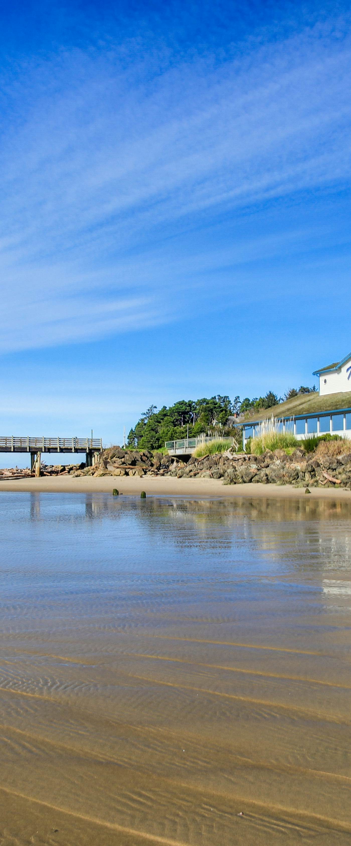 Waterfront Corner Condo with Fireplace and Ocean Views Close to Beach and Bay