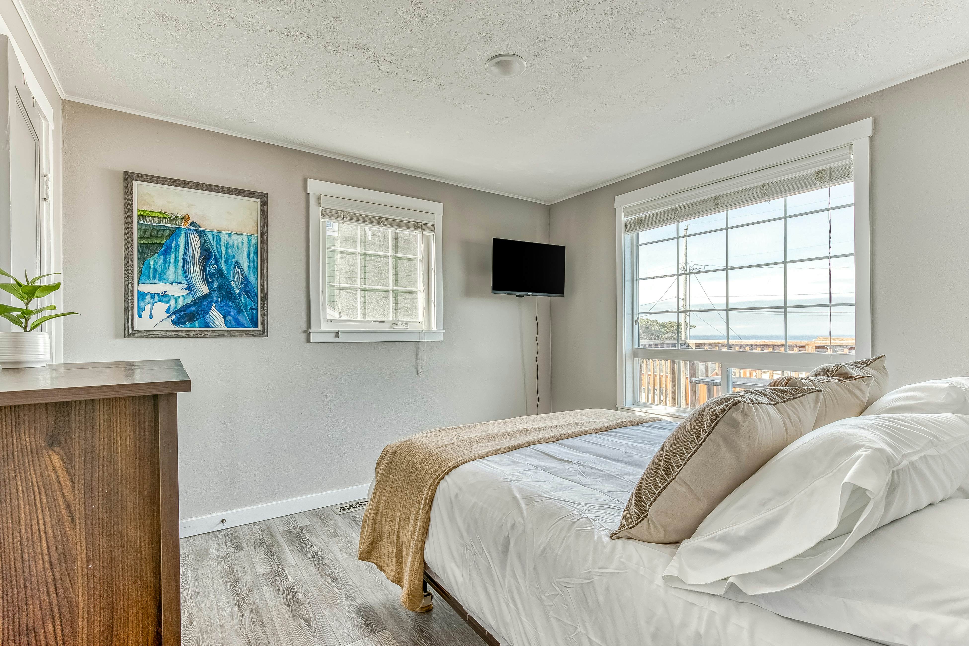 Dog friendly home with ocean views hot tub deck foosball and fireplace