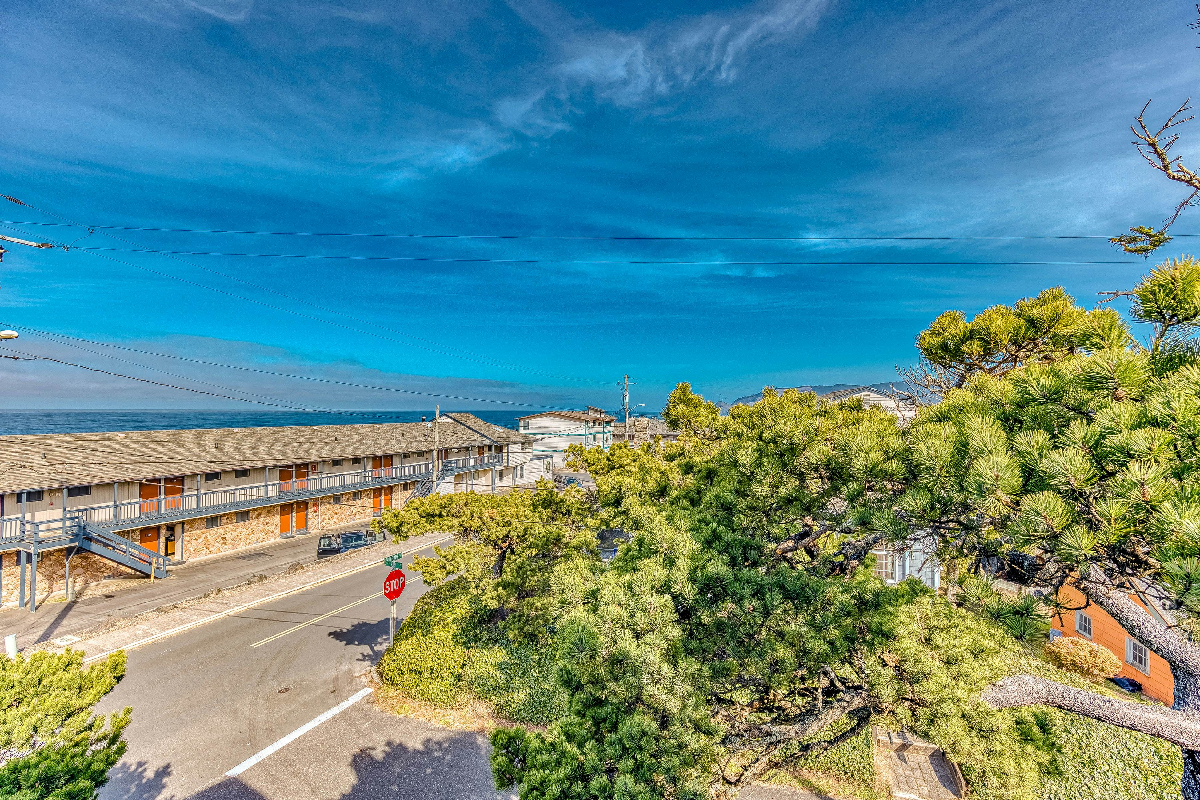 Dog friendly home with ocean views hot tub deck foosball and fireplace