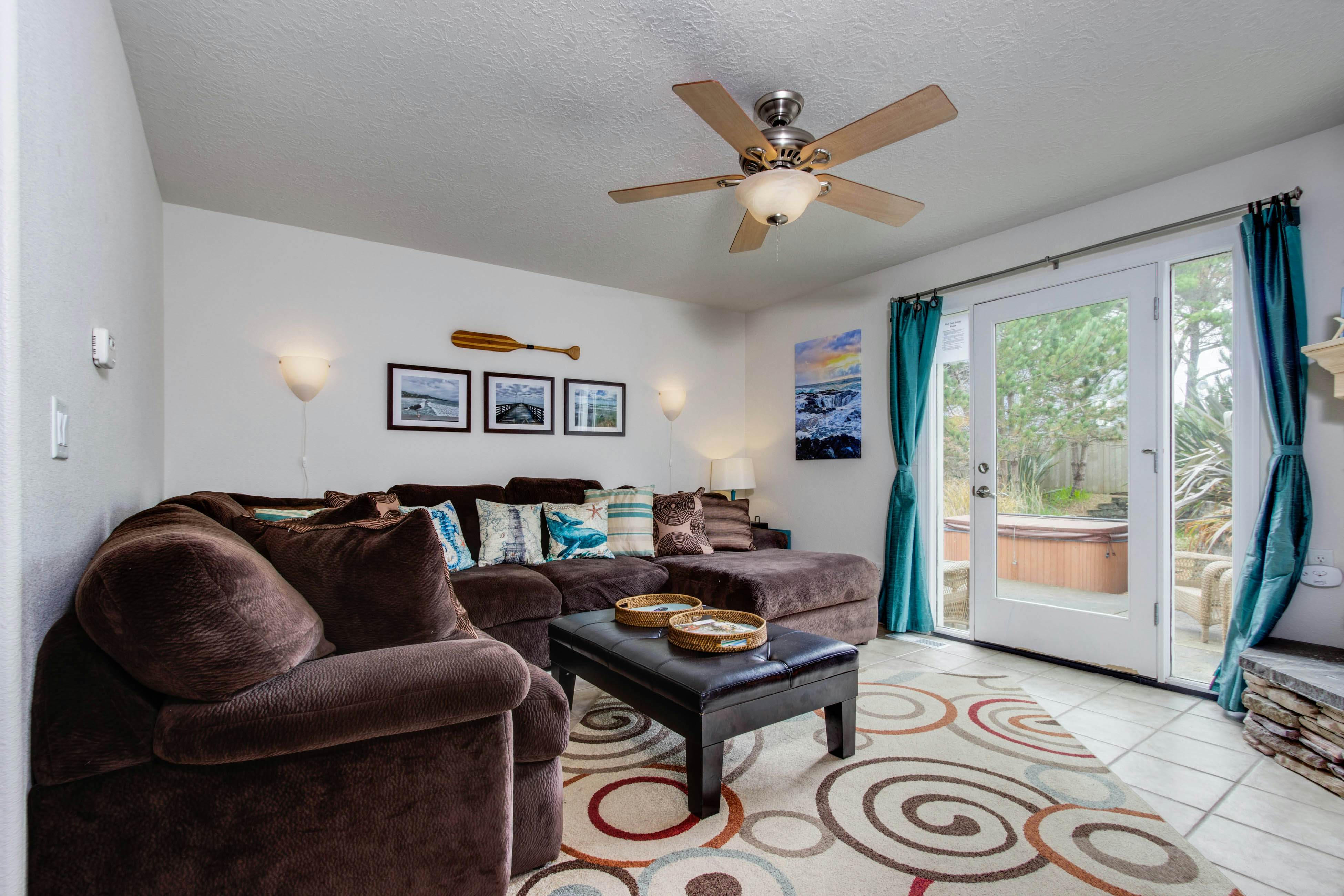 Beach escape with patio, private hot tub, & game room - steps to beach