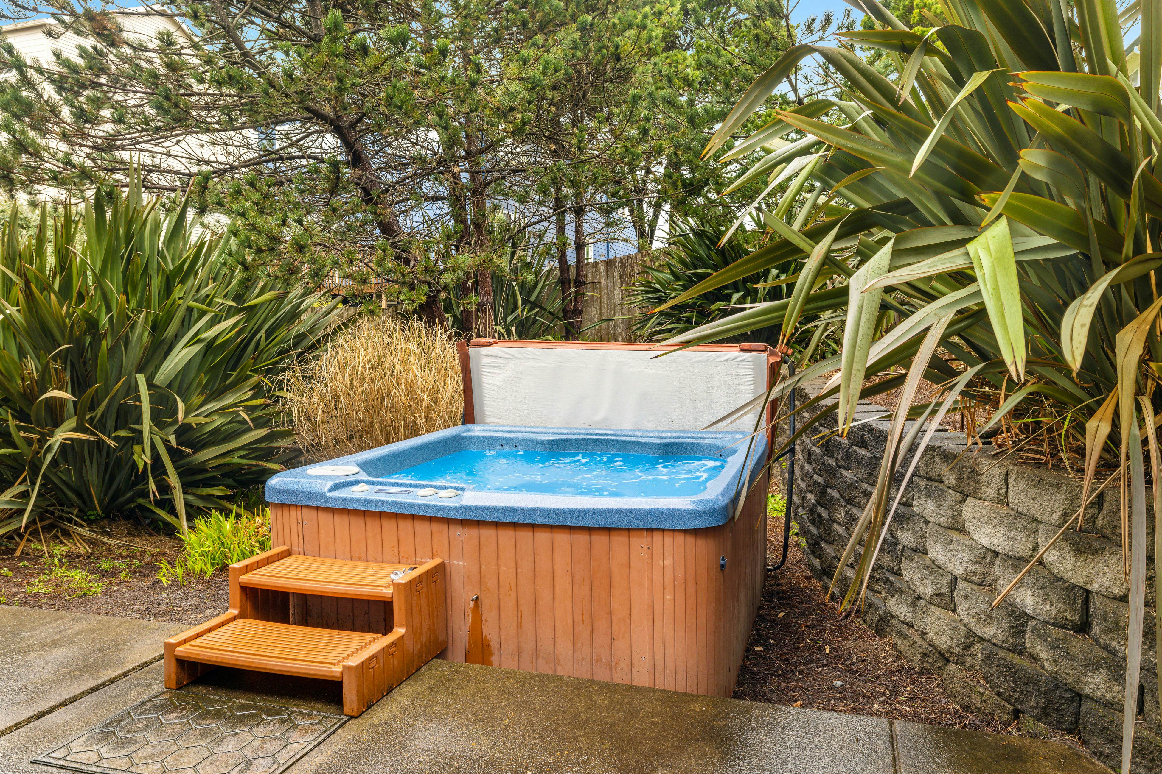 Beach escape with patio, private hot tub, & game room - steps to beach