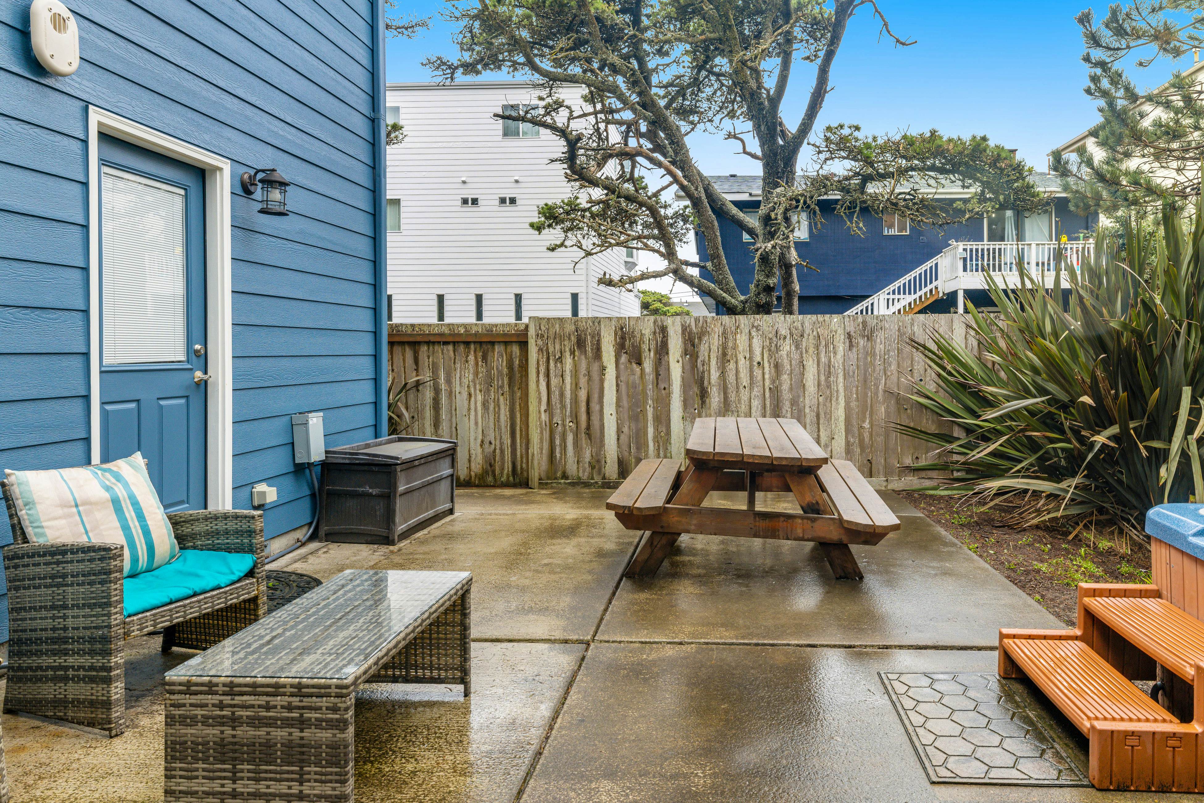 Beach escape with patio, private hot tub, & game room - steps to beach