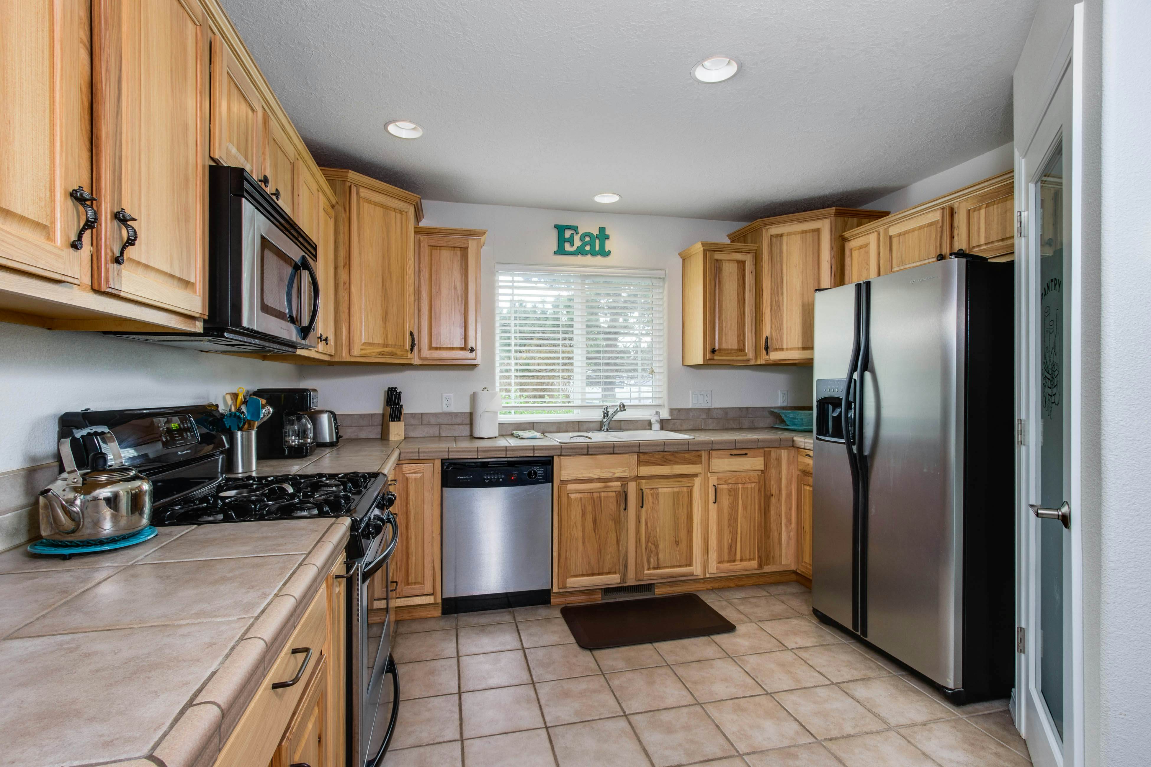 Beach escape with patio, private hot tub, & game room - steps to beach