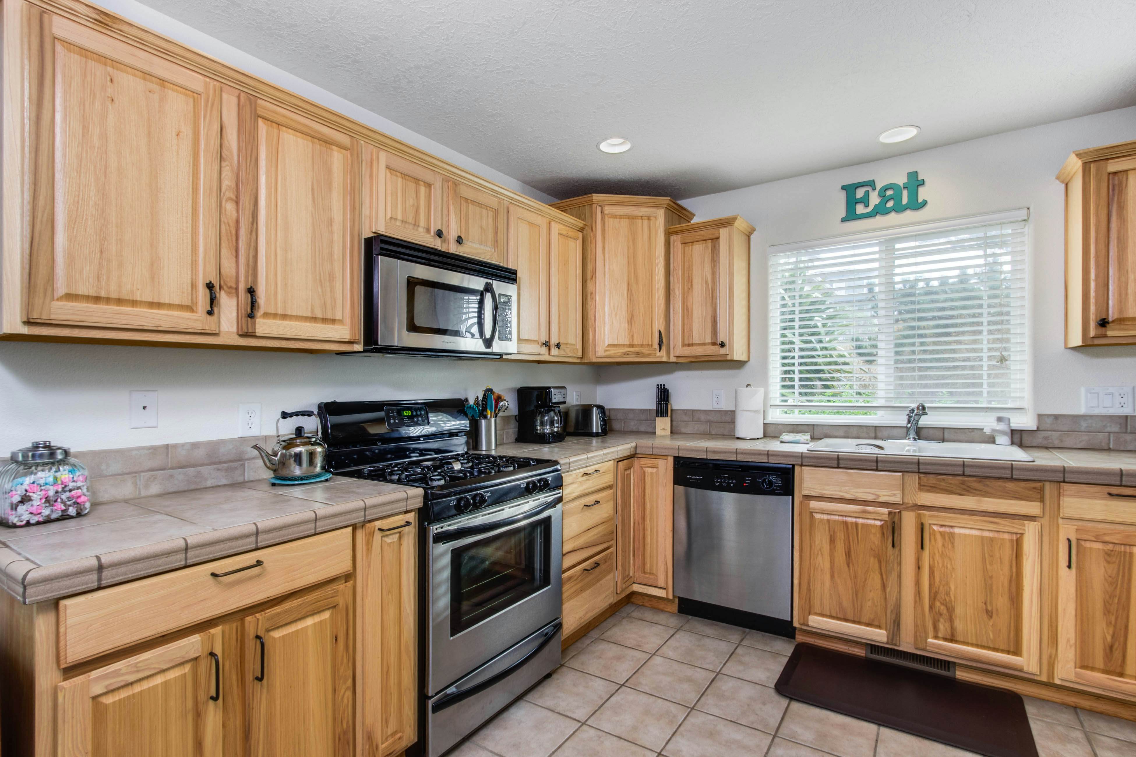 Beach escape with patio, private hot tub, & game room - steps to beach