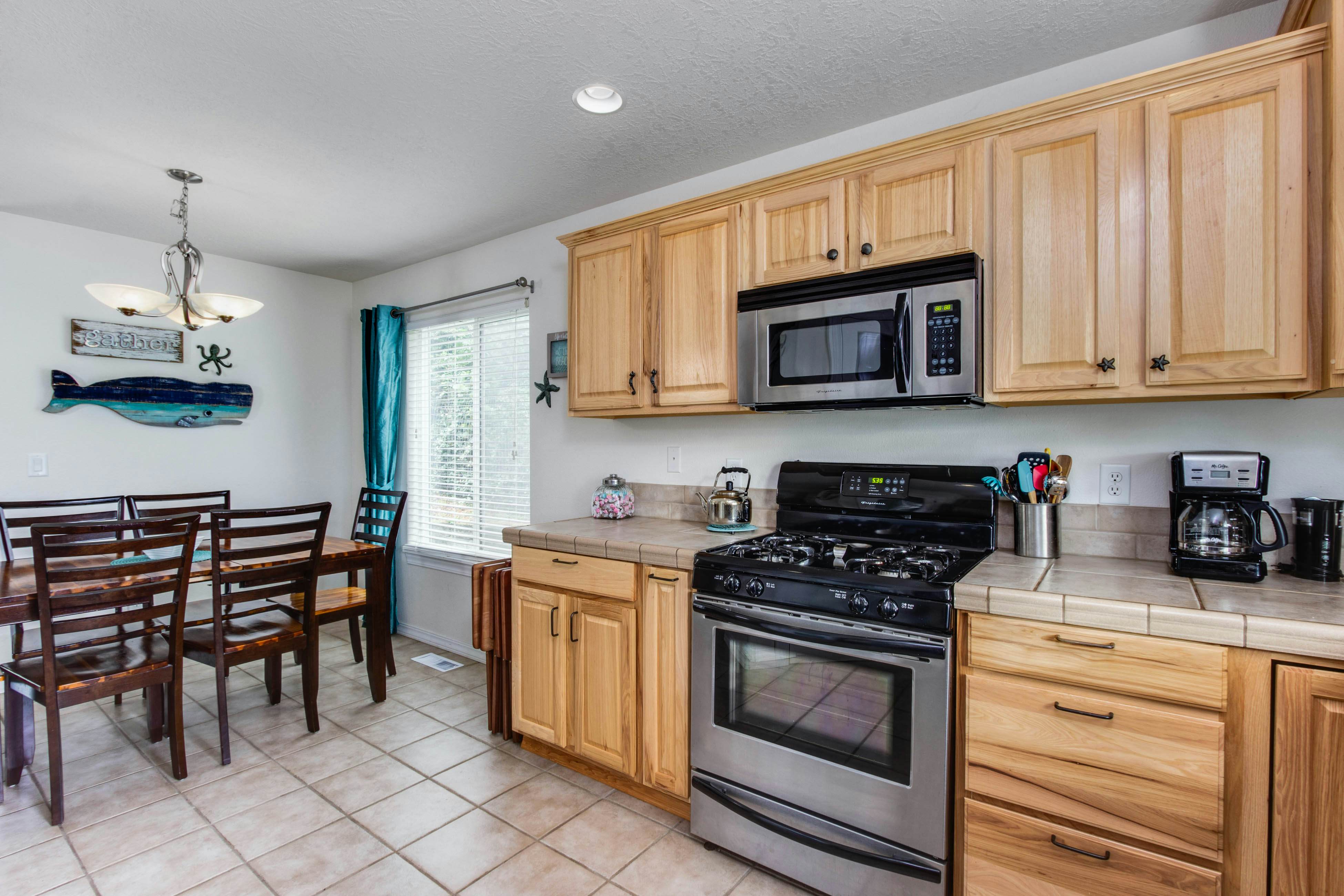 Beach escape with patio, private hot tub, & game room - steps to beach