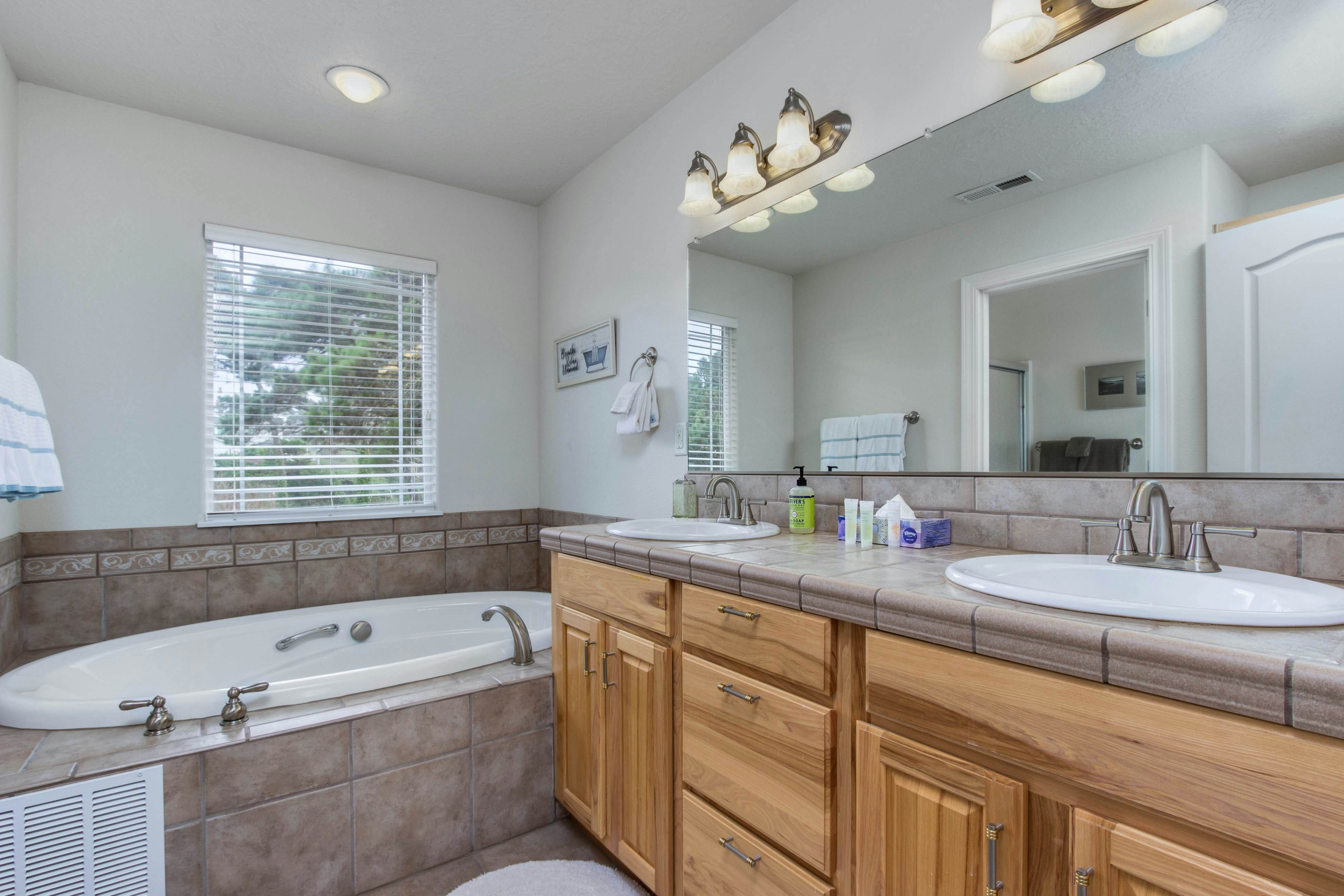 Beach escape with patio, private hot tub, & game room - steps to beach