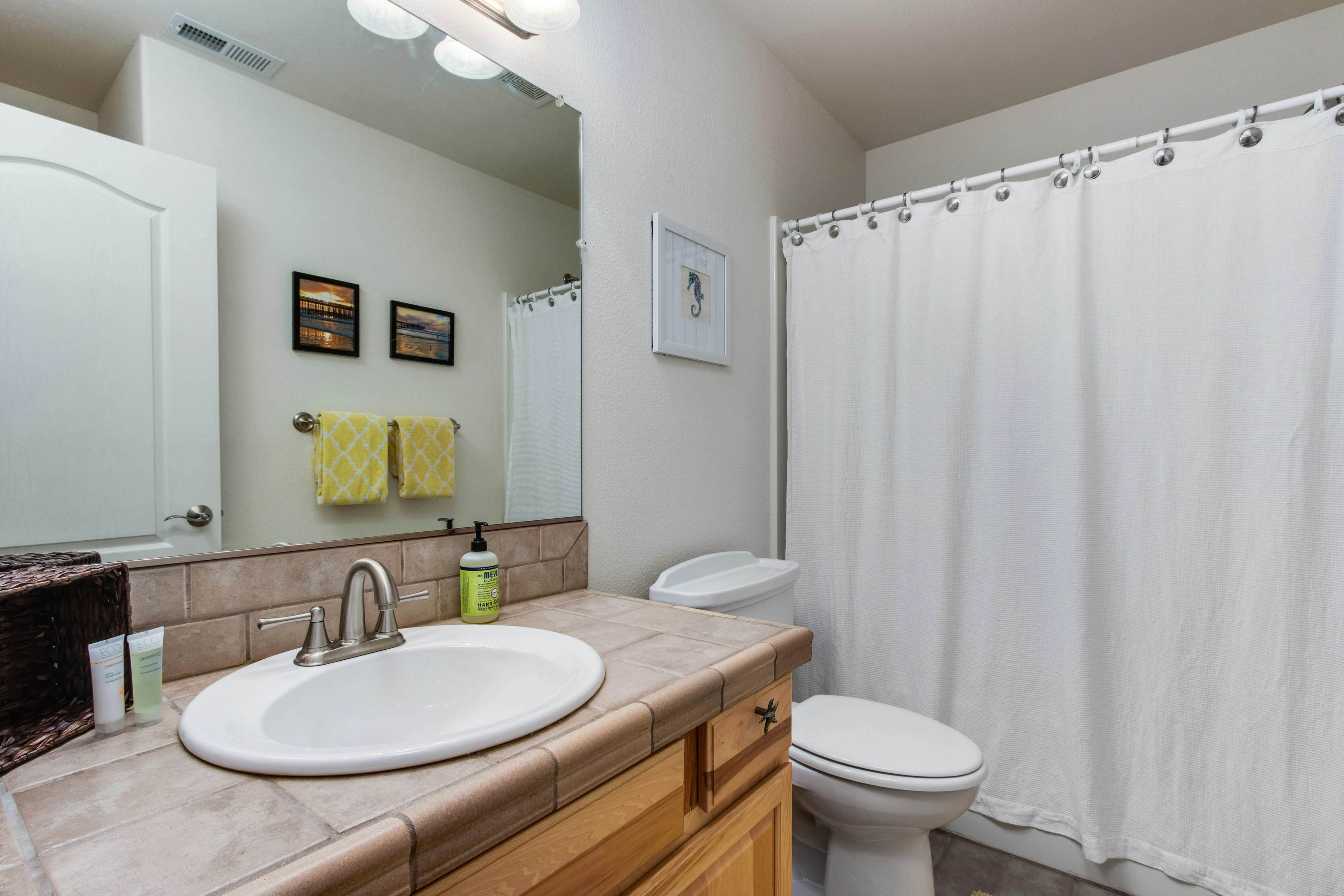 Beach escape with patio, private hot tub, & game room - steps to beach