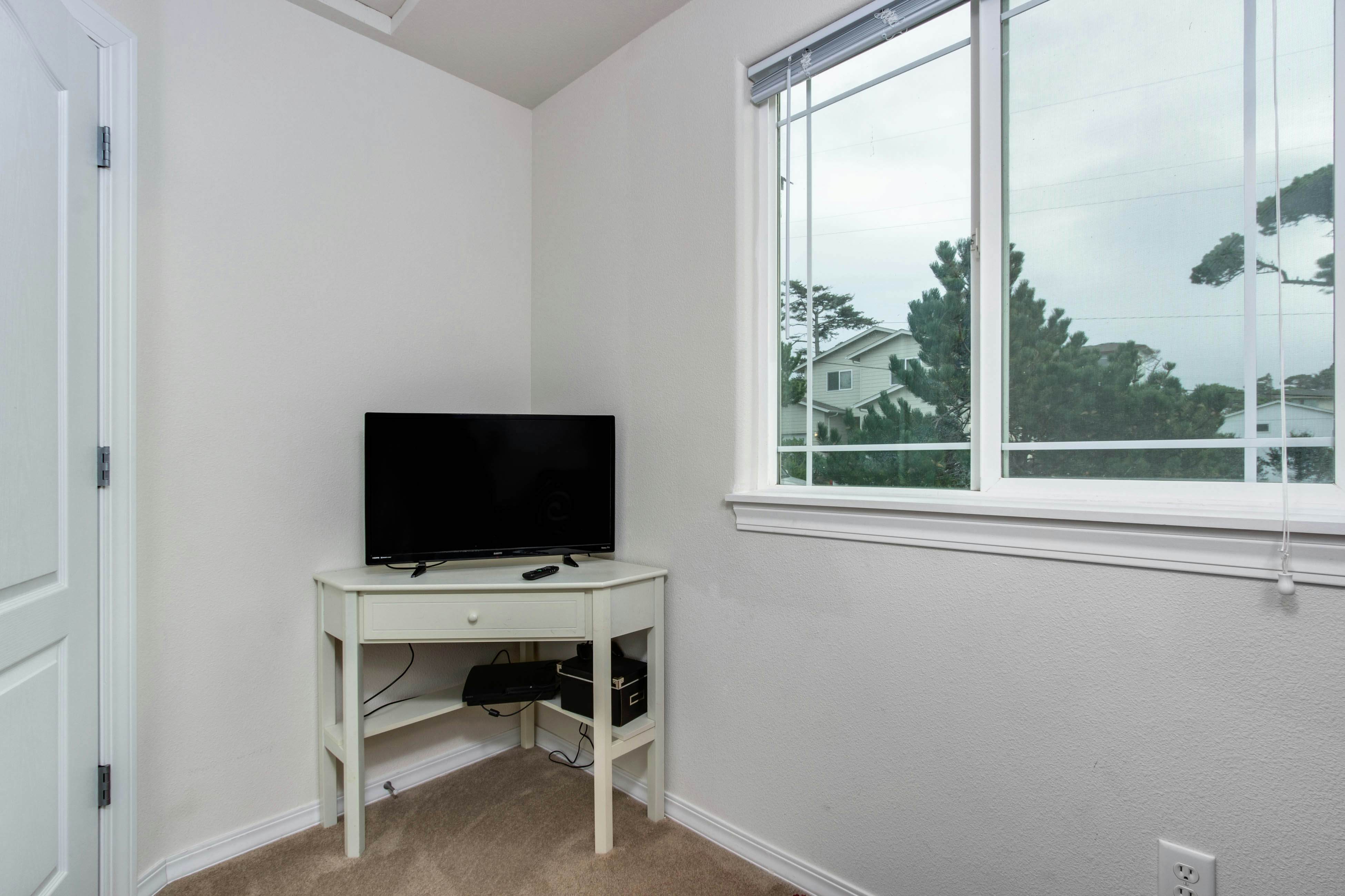 Beach escape with patio, private hot tub, & game room - steps to beach