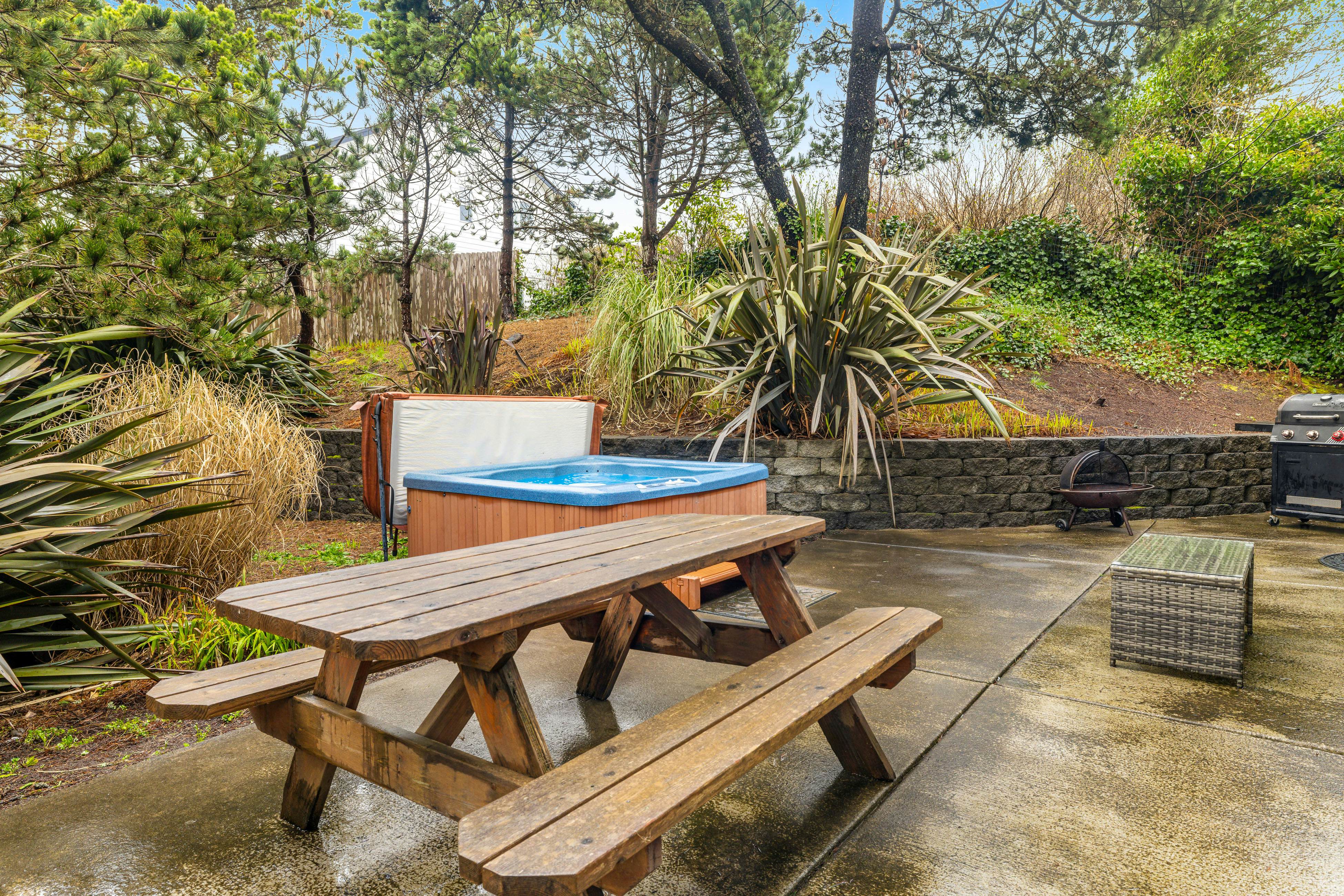 Beach escape with patio, private hot tub, & game room - steps to beach