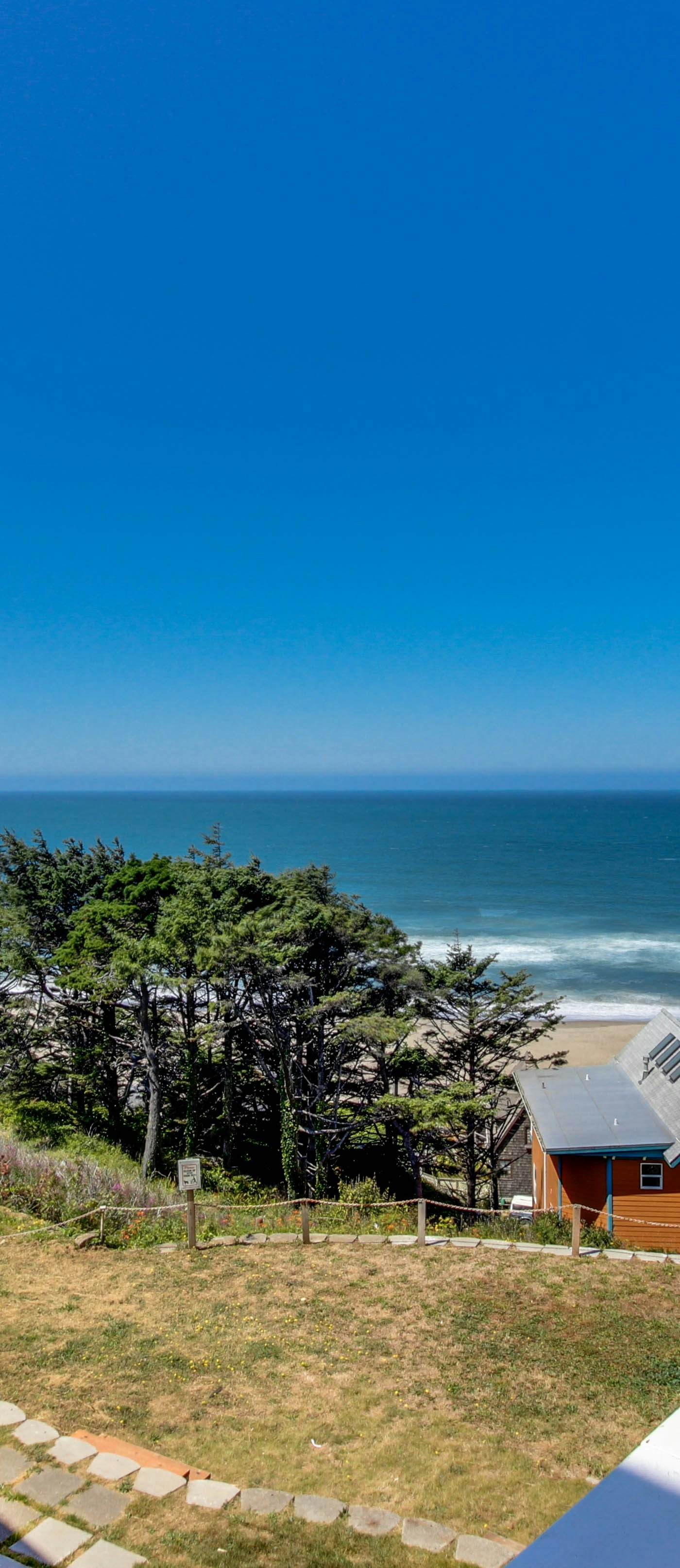 Dog Friendly Condo with Partial Ocean Views Short Walk to the Beach