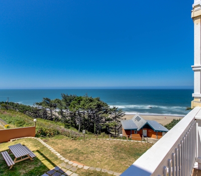 Dog Friendly Condo with Partial Ocean Views Short Walk to the Beach