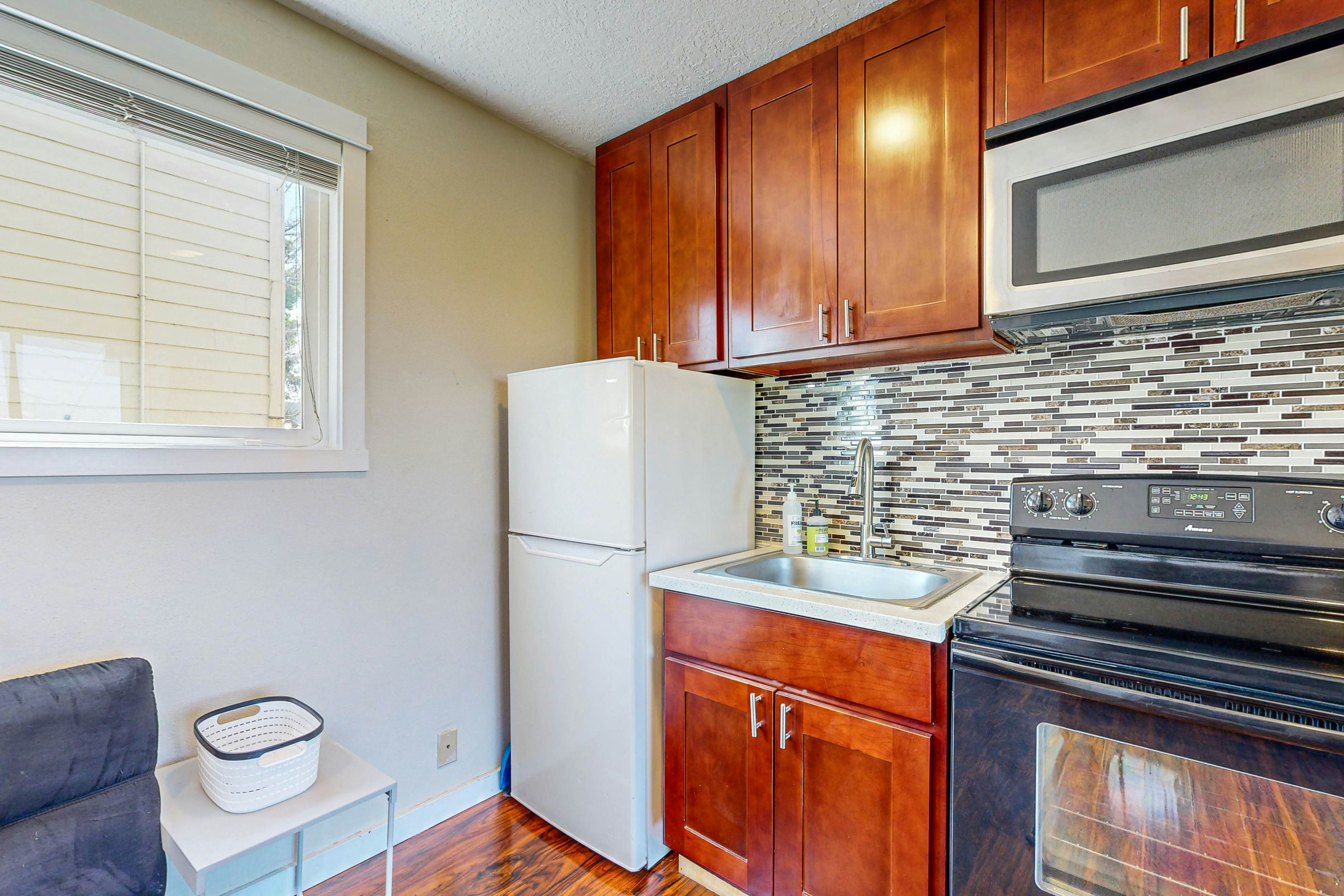 Dog-Friendly Condo with Partial Ocean Views - Short Walk to the Beach