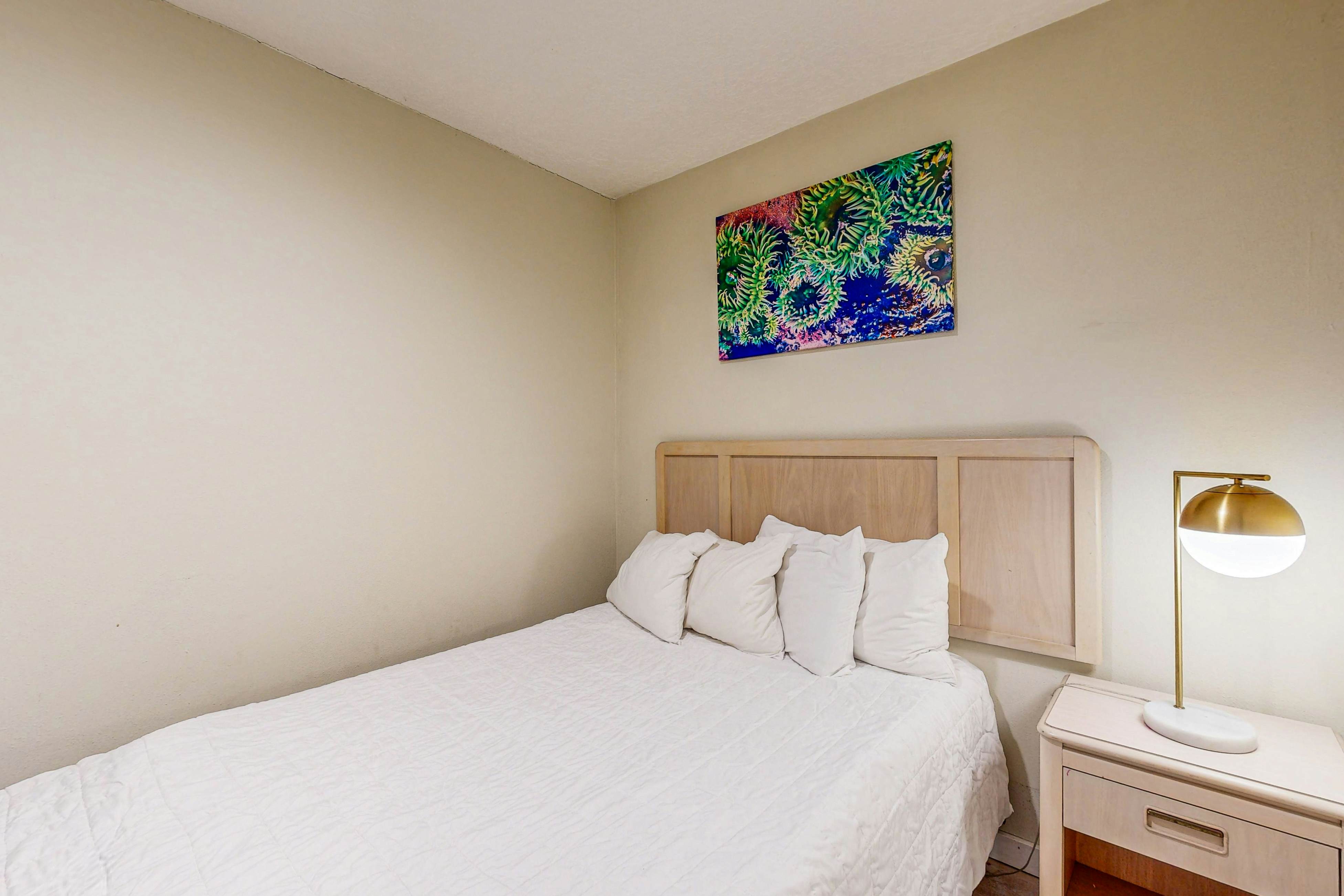 Dog-Friendly Condo with Partial Ocean Views - Short Walk to the Beach