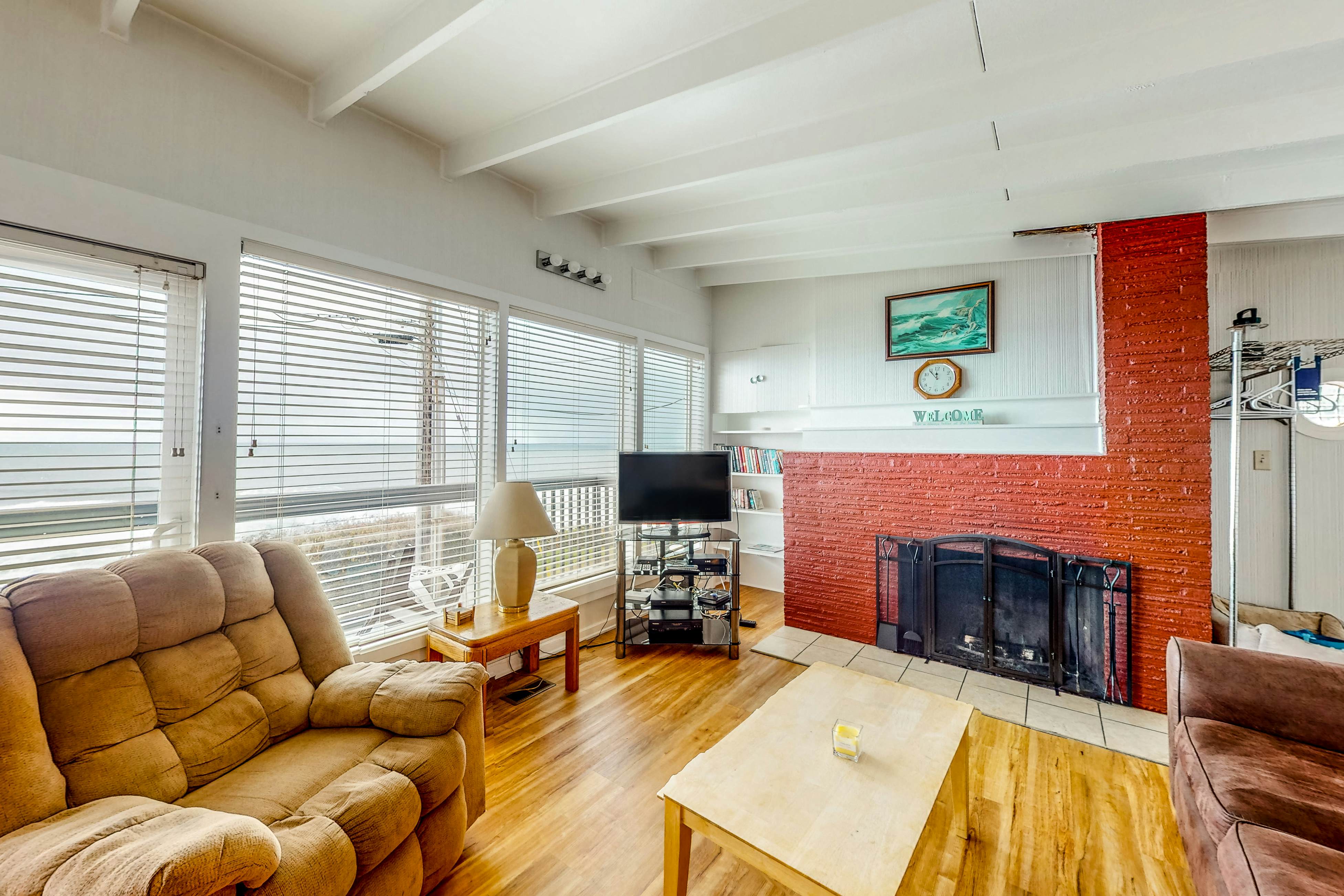 Dog-friendly home with deck & ocean views - close to the beach