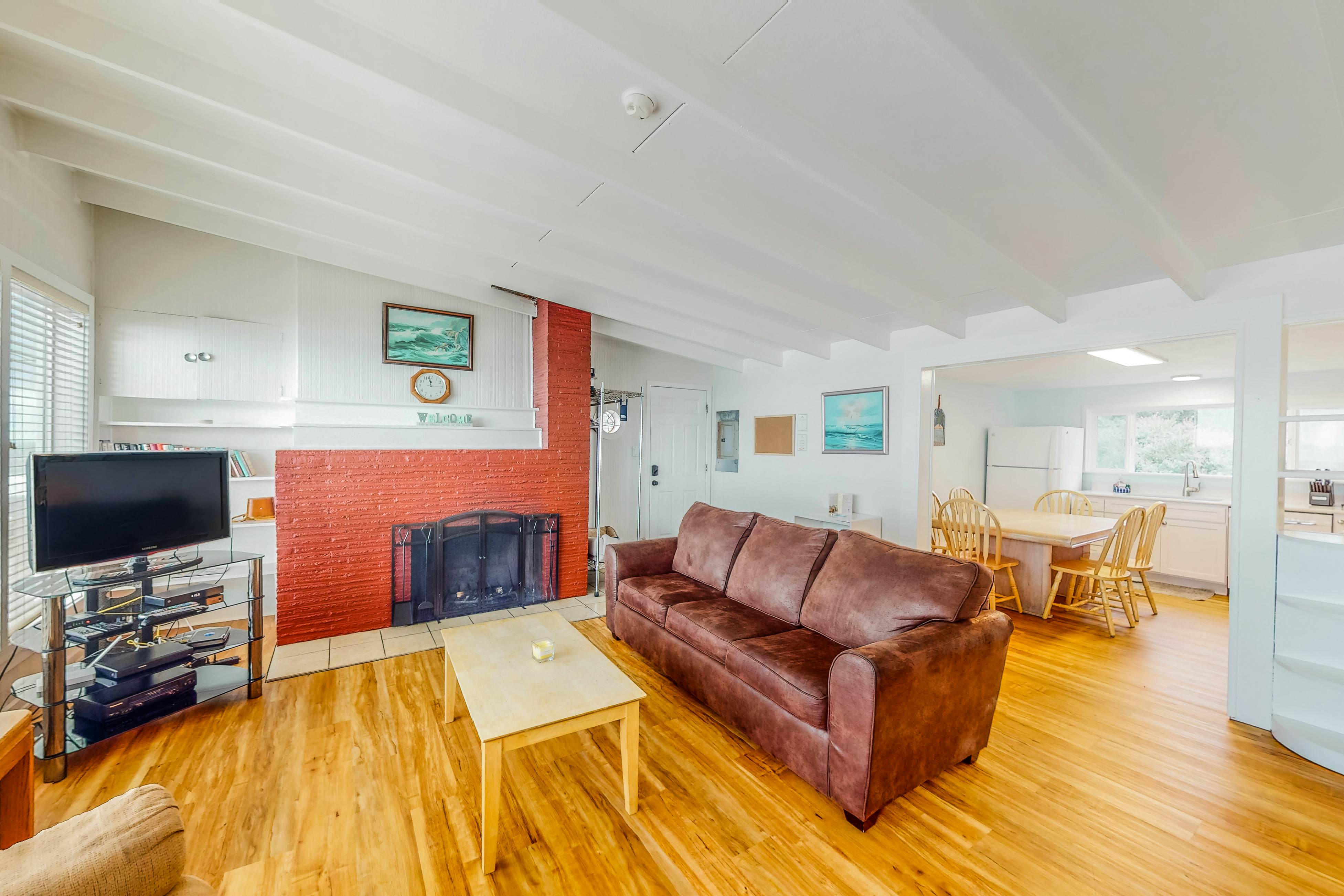 Dog-friendly home with deck & ocean views - close to the beach