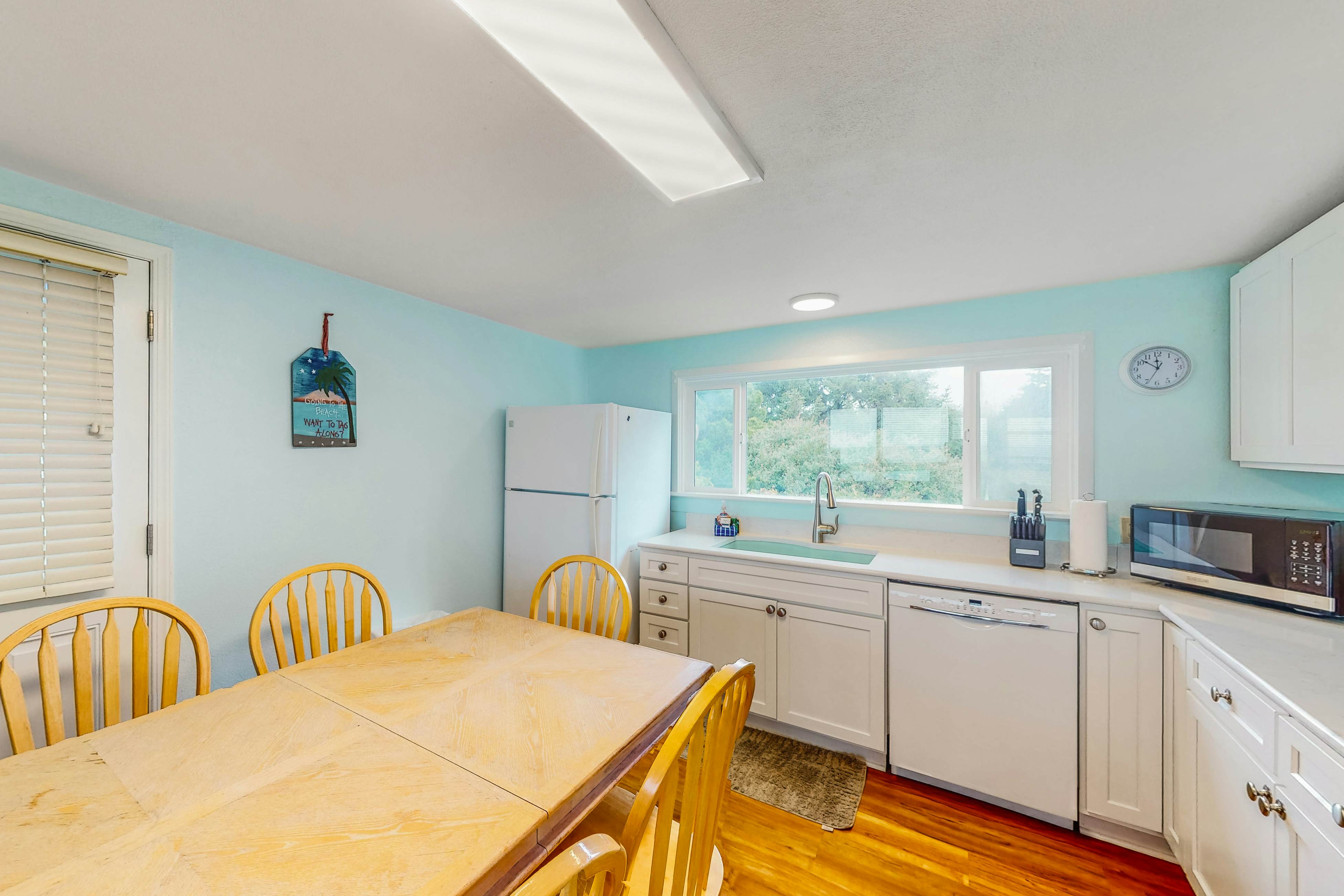 Dog-friendly home with deck & ocean views - close to the beach