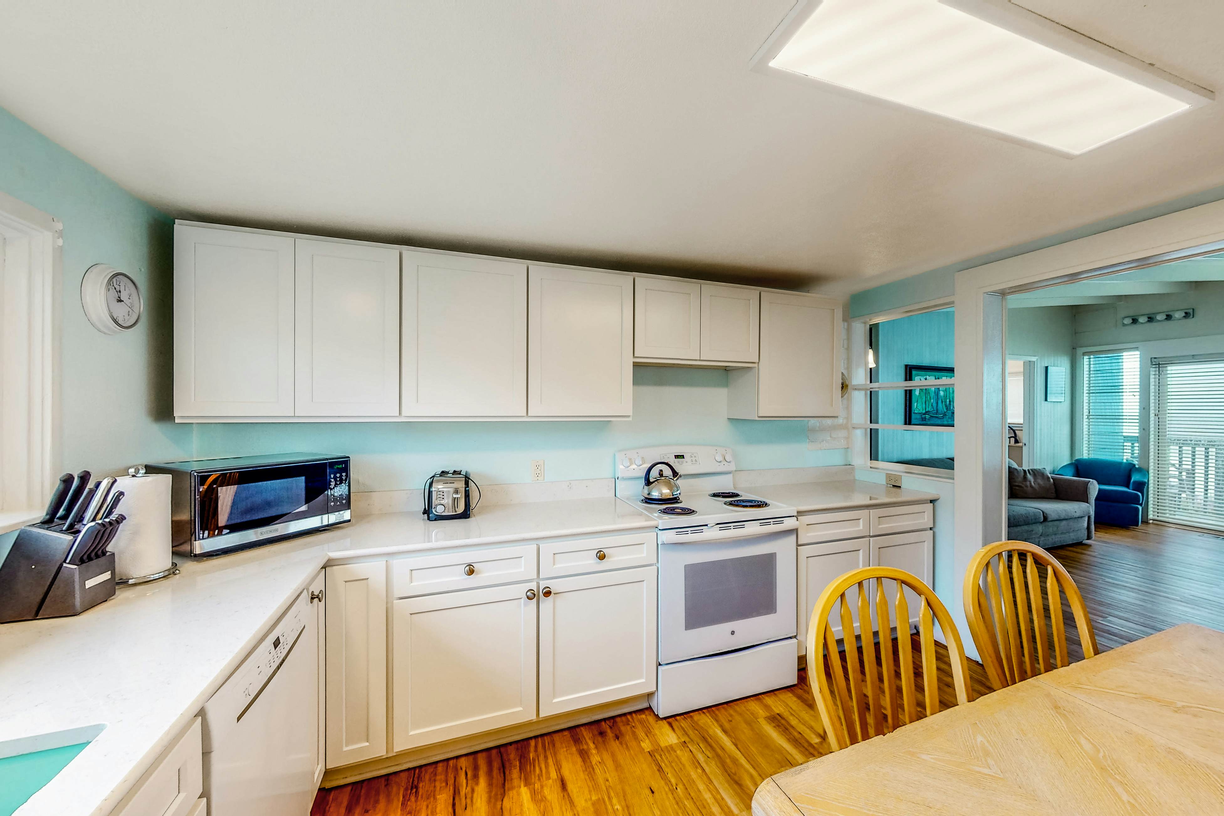 Dog-friendly home with deck & ocean views - close to the beach