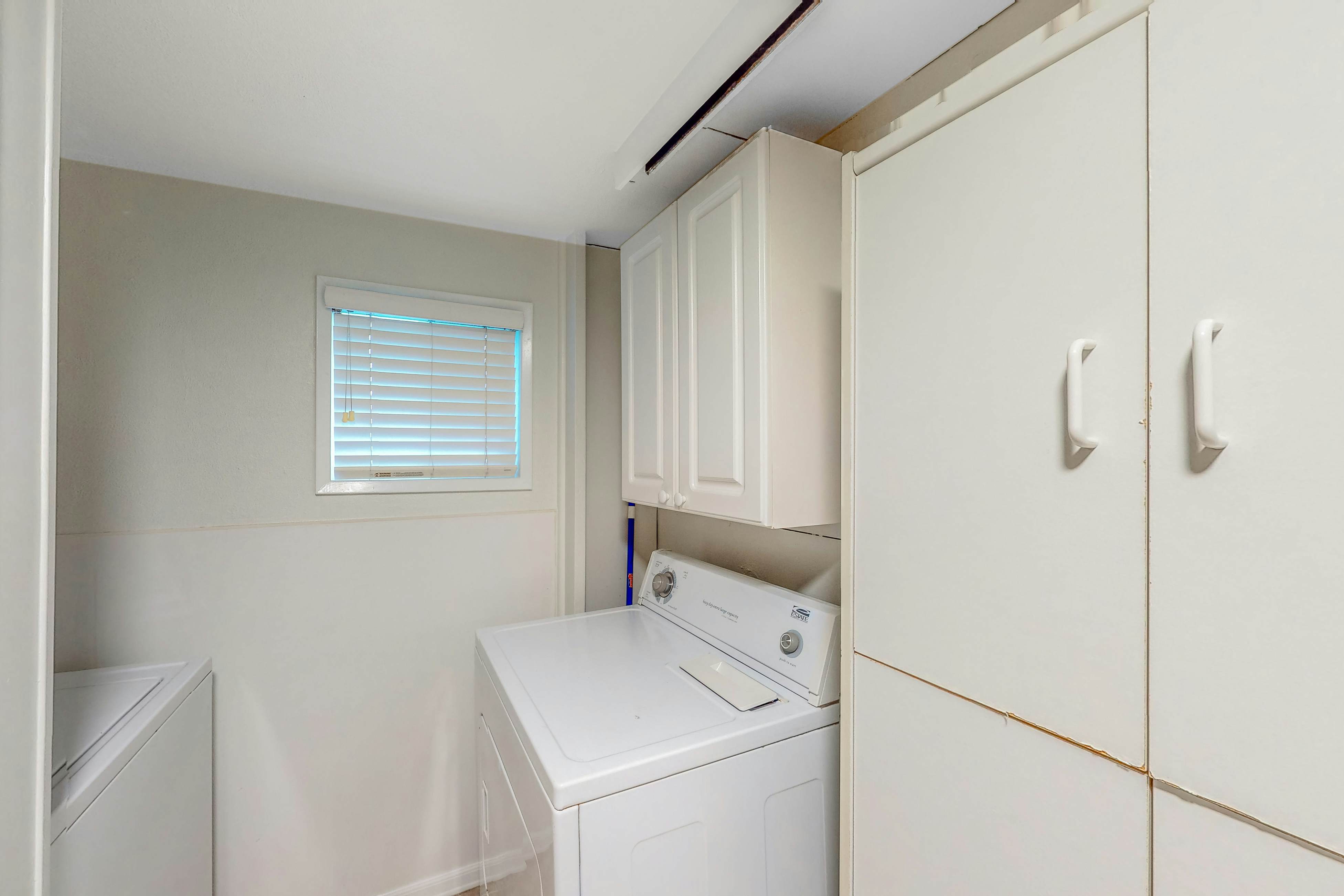 Dog-friendly home with deck & ocean views - close to the beach