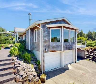 Stunning coastal home with ocean views firepit and media room walk to beach