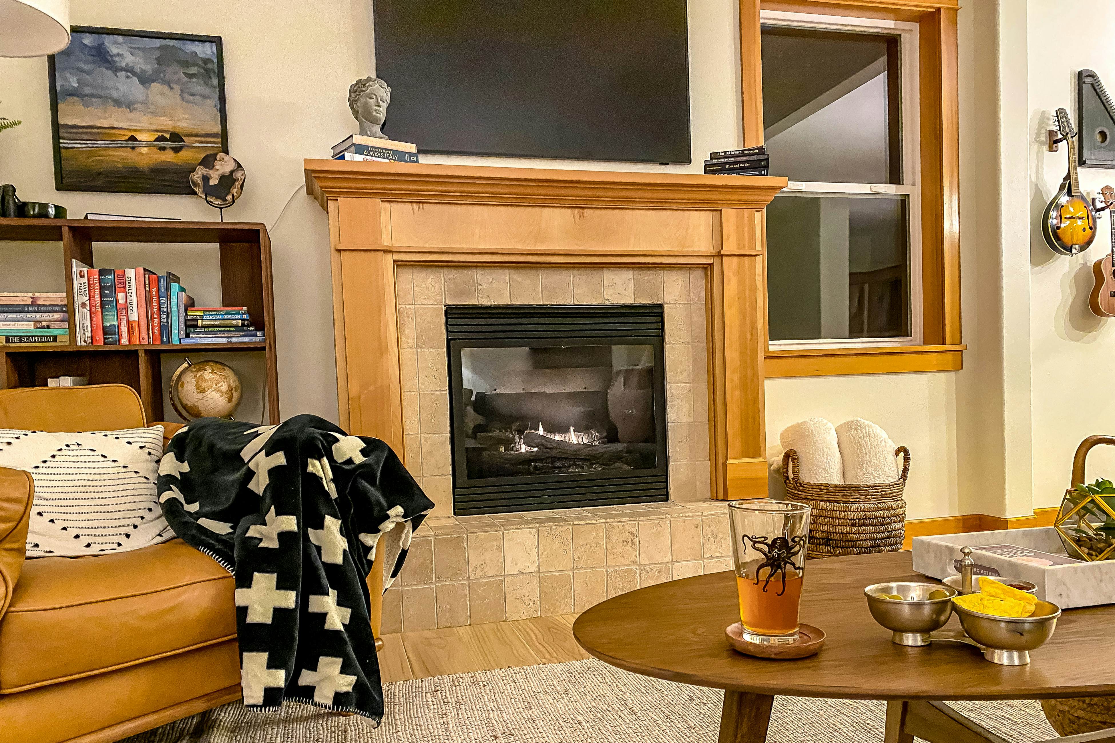 Dog-friendly home with ocean views, deck, washer/dryer, grill, & fireplace