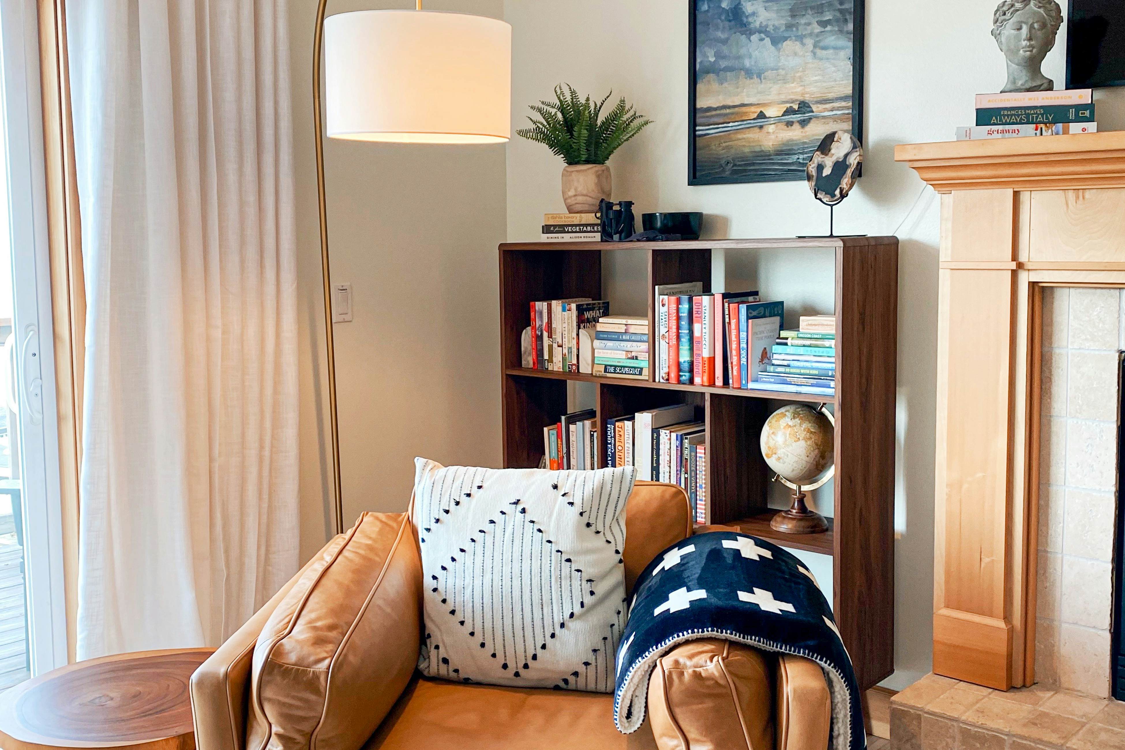 Dog-friendly home with ocean views, deck, washer/dryer, grill, & fireplace