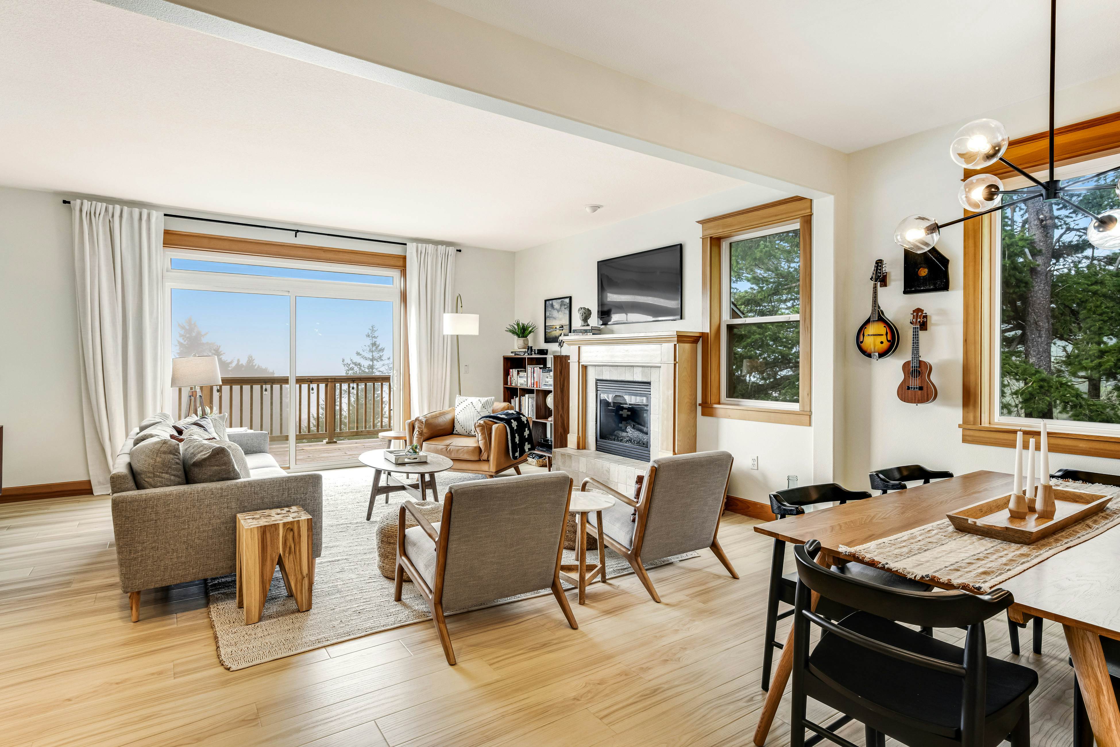 Dog-friendly home with ocean views, deck, washer/dryer, grill, & fireplace