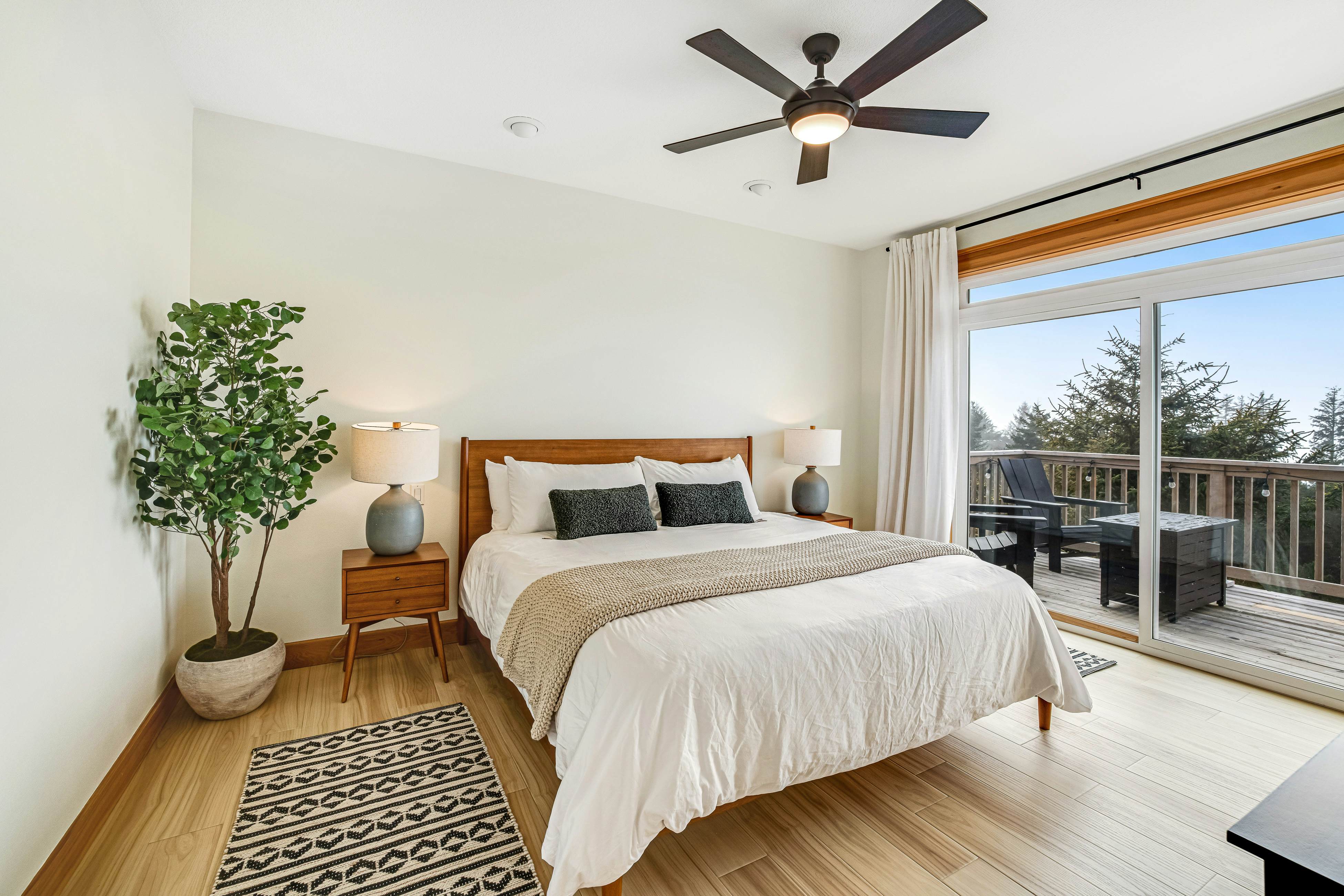 Dog-friendly home with ocean views, deck, washer/dryer, grill, & fireplace