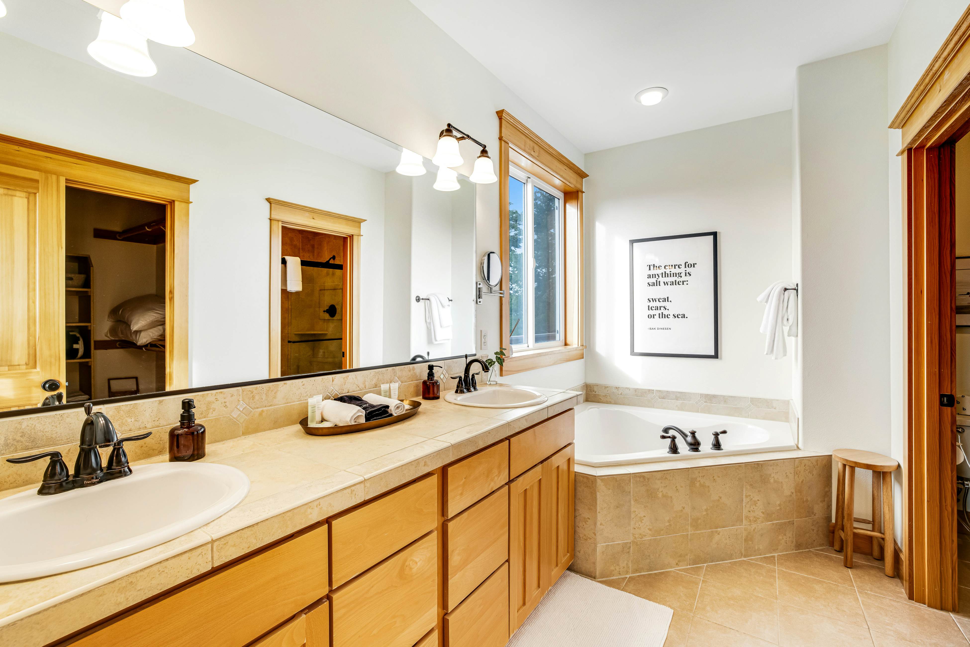 Dog-friendly home with ocean views, deck, washer/dryer, grill, & fireplace