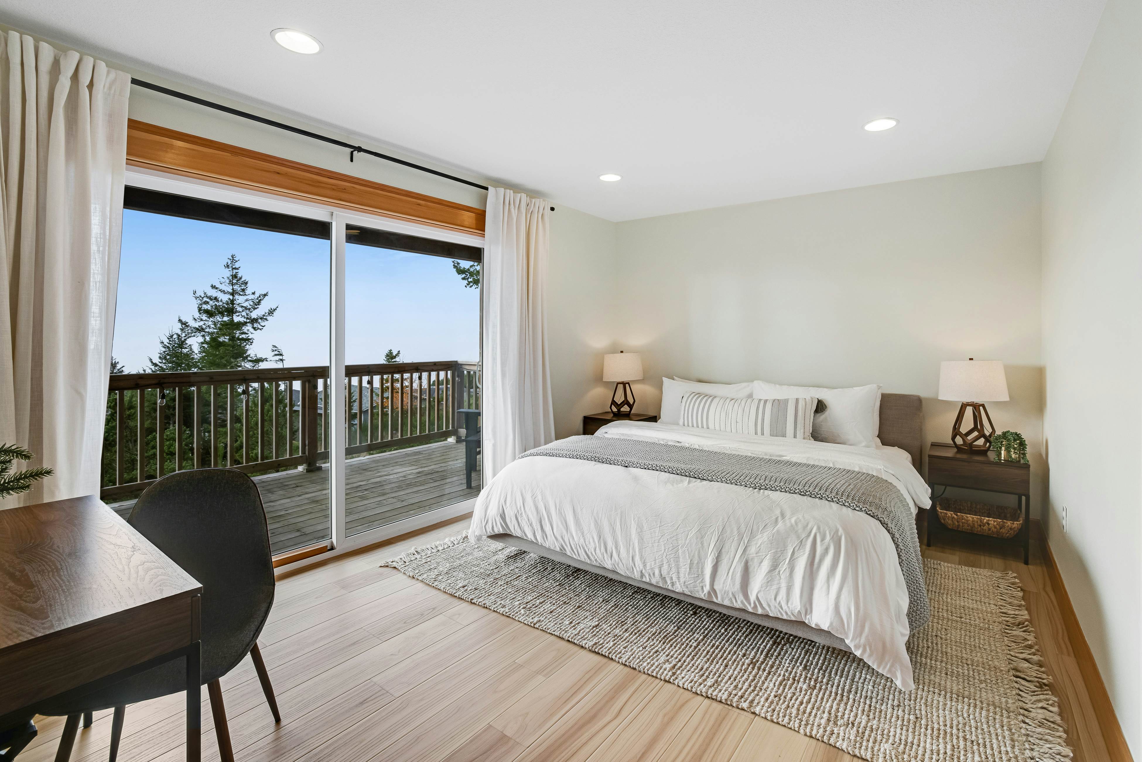 Dog-friendly home with ocean views, deck, washer/dryer, grill, & fireplace