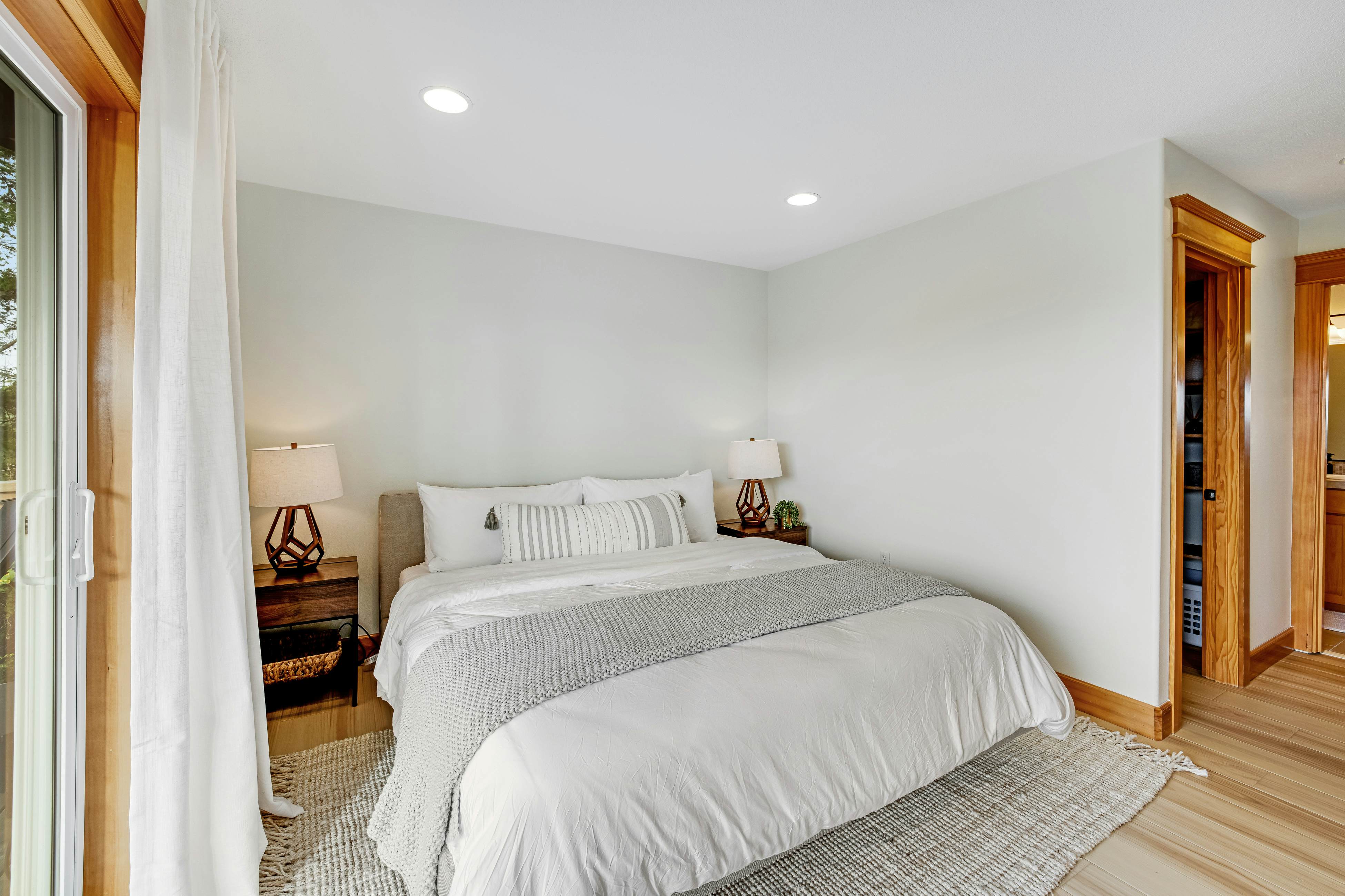 Dog-friendly home with ocean views, deck, washer/dryer, grill, & fireplace