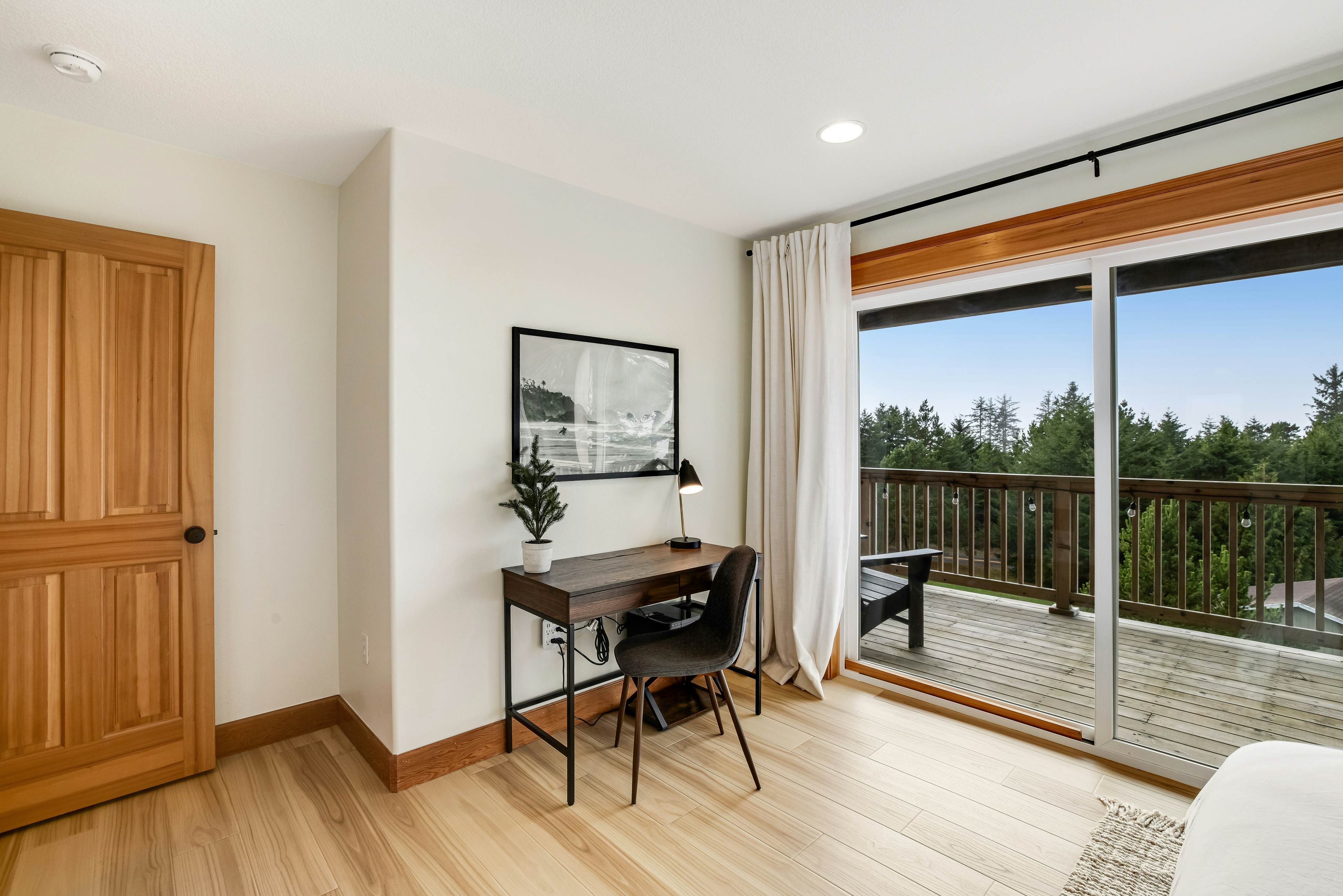 Dog-friendly home with ocean views, deck, washer/dryer, grill, & fireplace