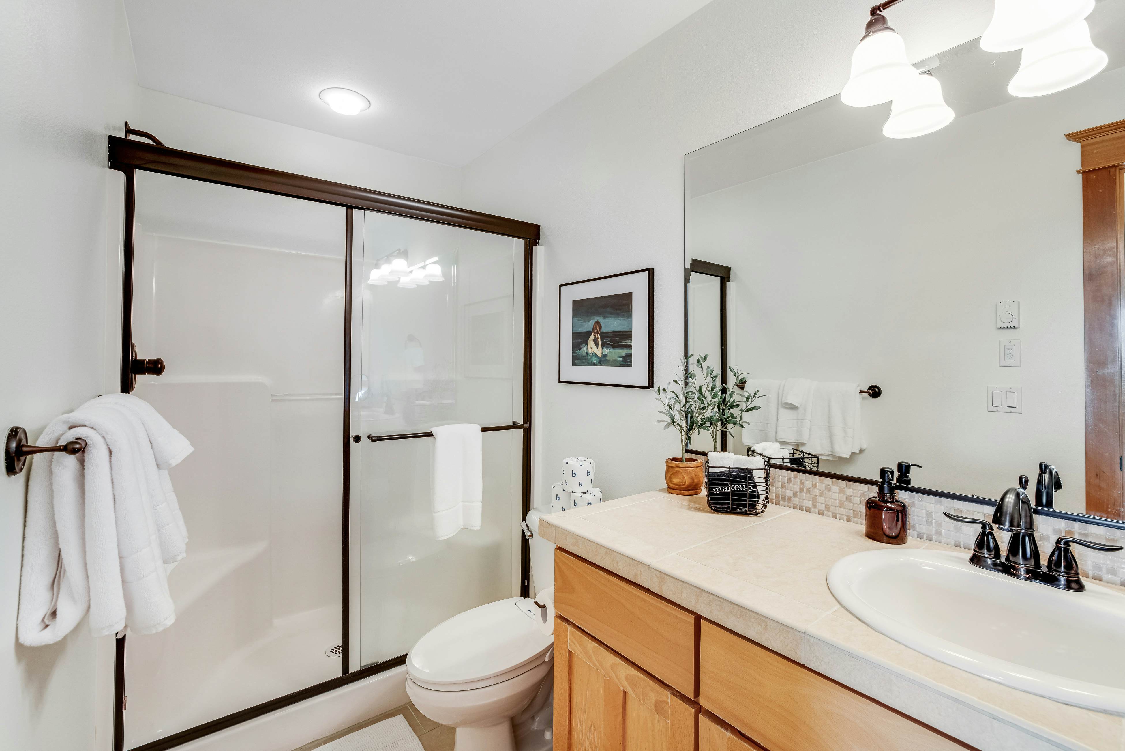 Dog-friendly home with ocean views, deck, washer/dryer, grill, & fireplace