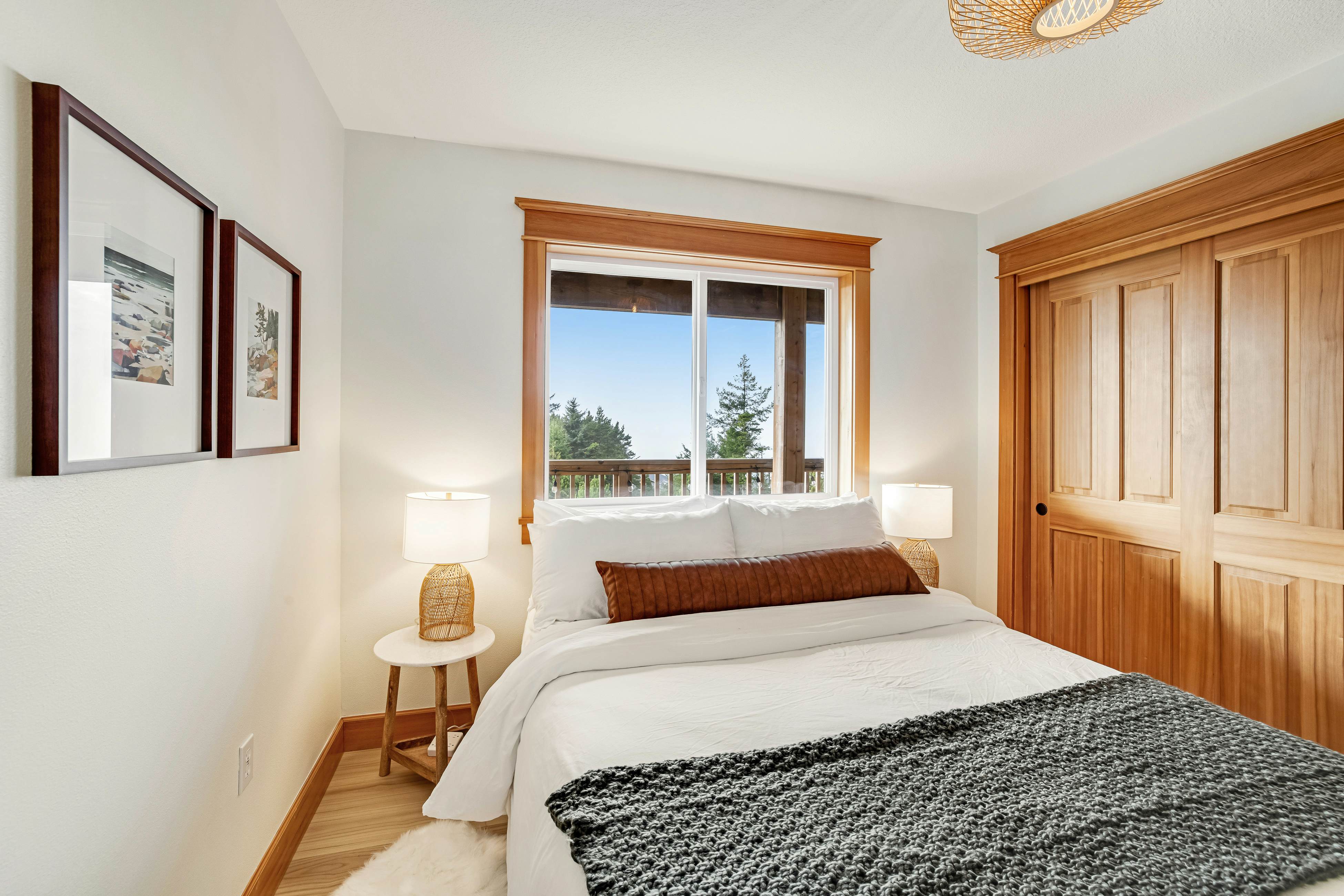 Dog-friendly home with ocean views, deck, washer/dryer, grill, & fireplace