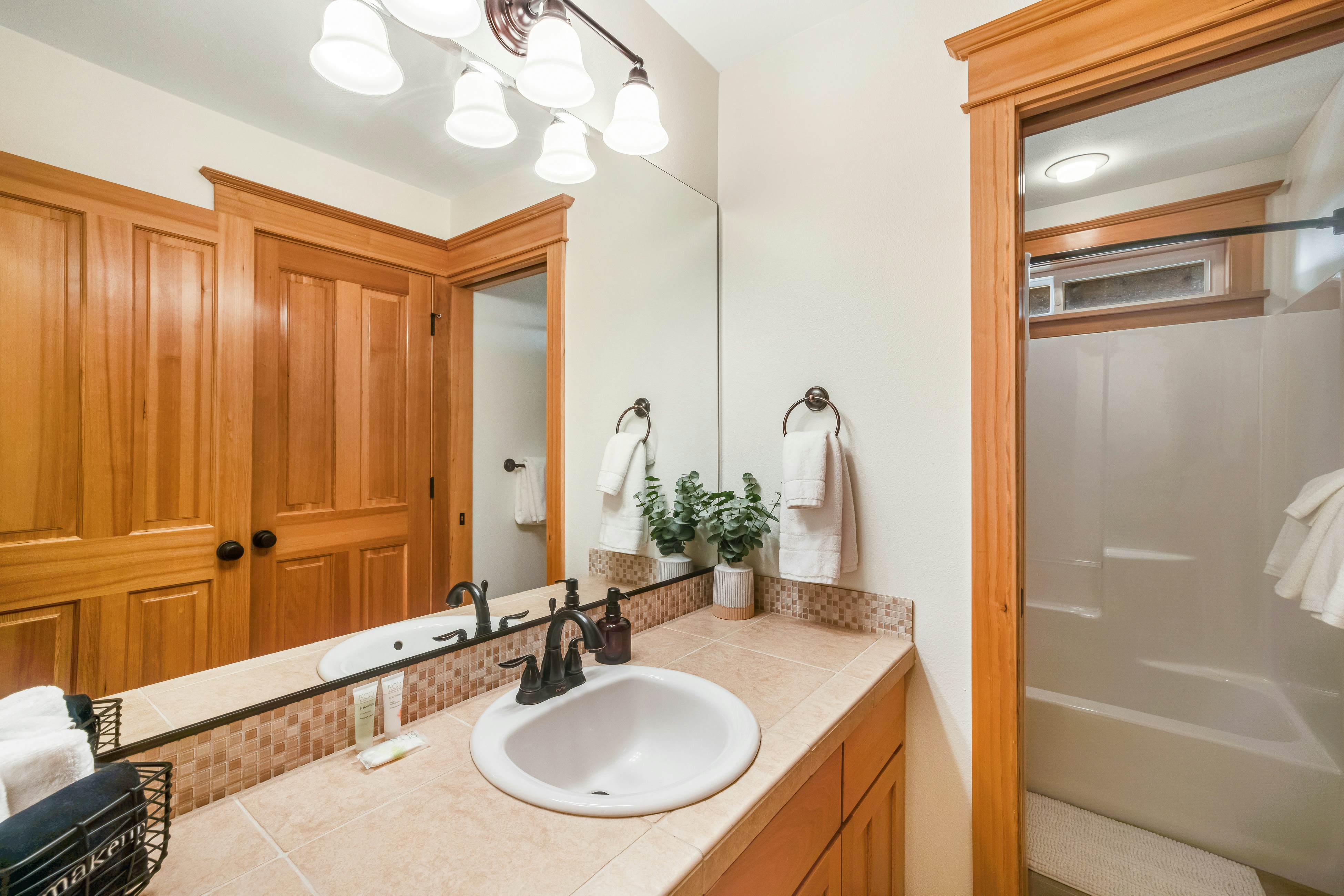 Dog-friendly home with ocean views, deck, washer/dryer, grill, & fireplace