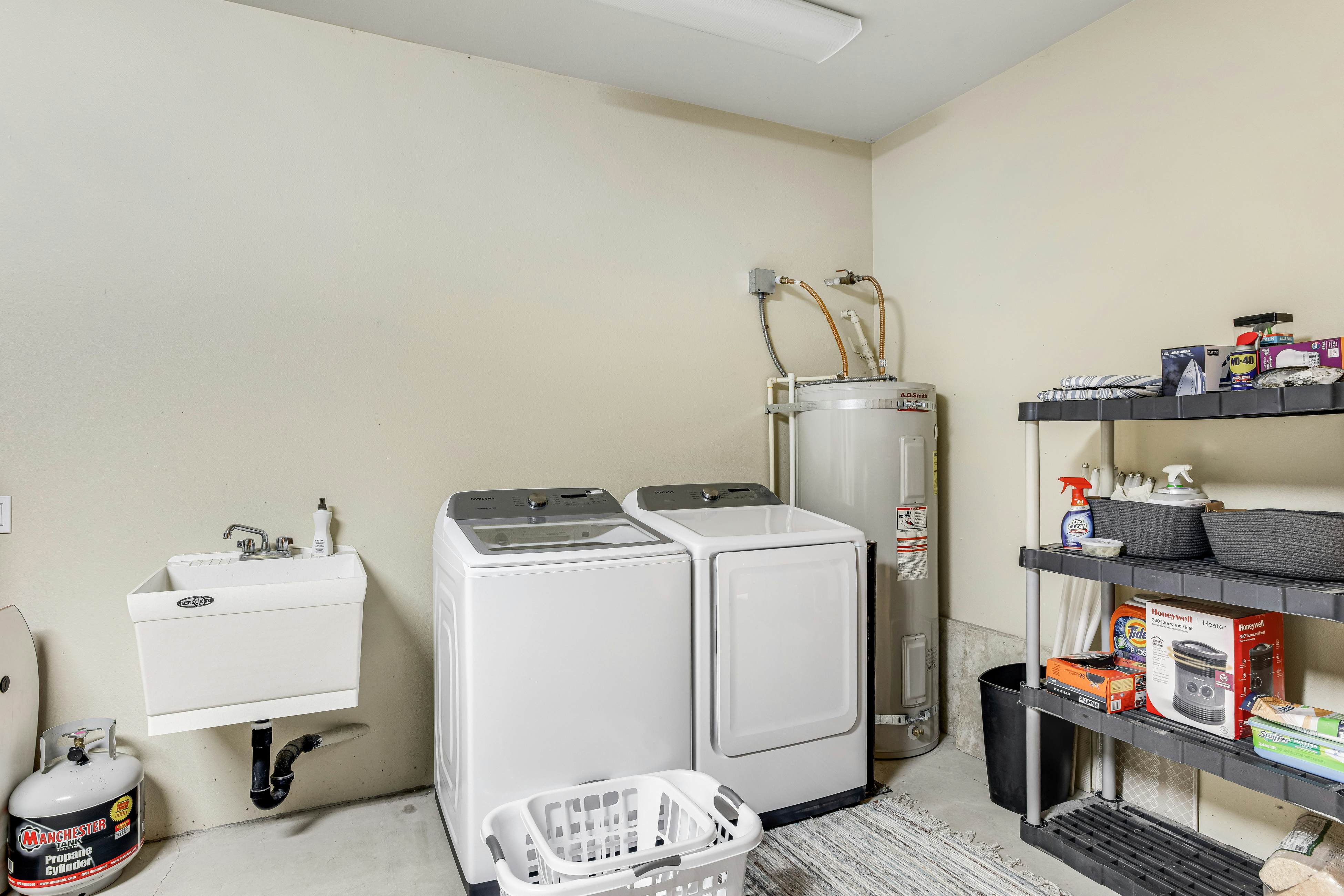 Dog-friendly home with ocean views, deck, washer/dryer, grill, & fireplace