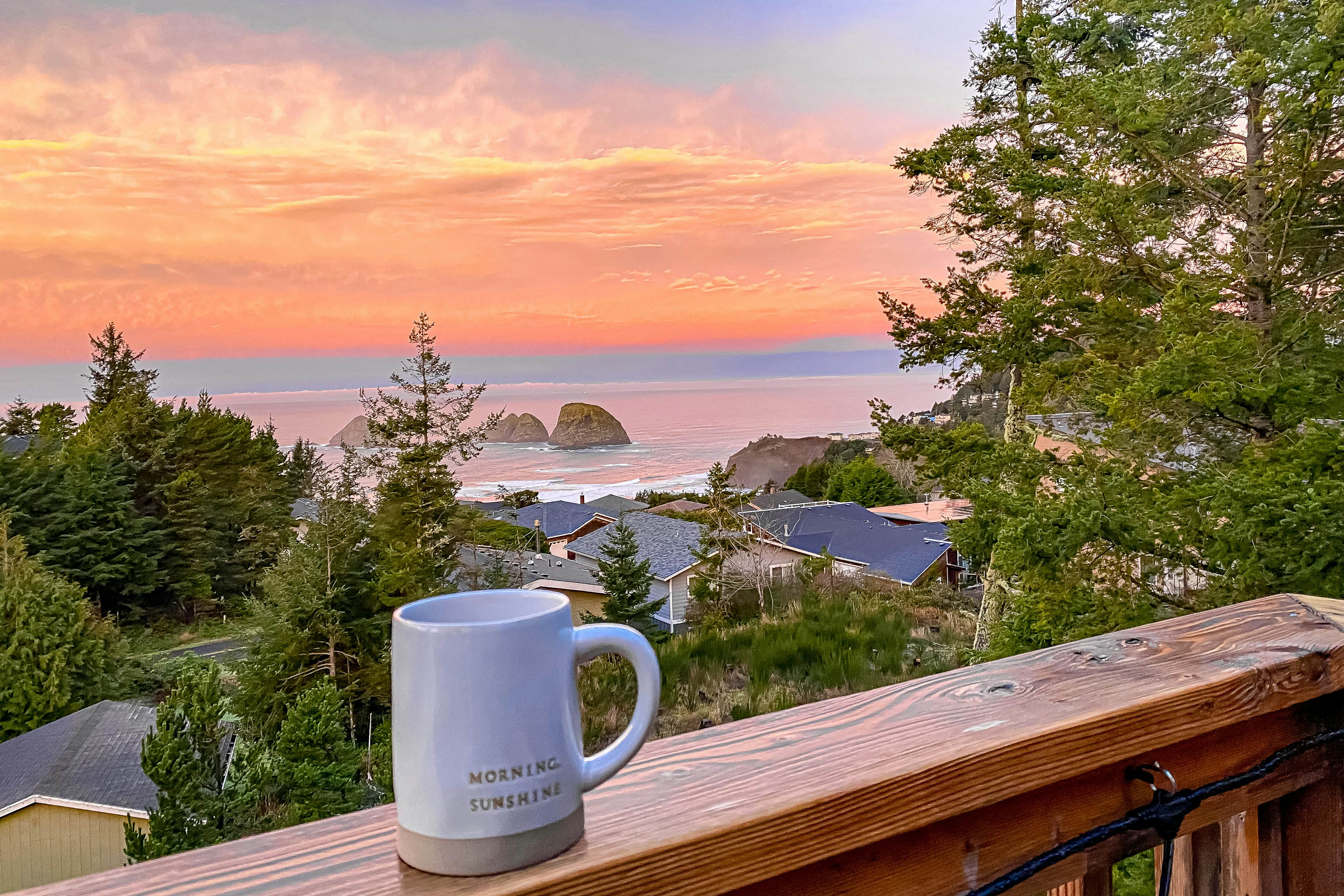 Dog-friendly home with ocean views, deck, washer/dryer, grill, & fireplace