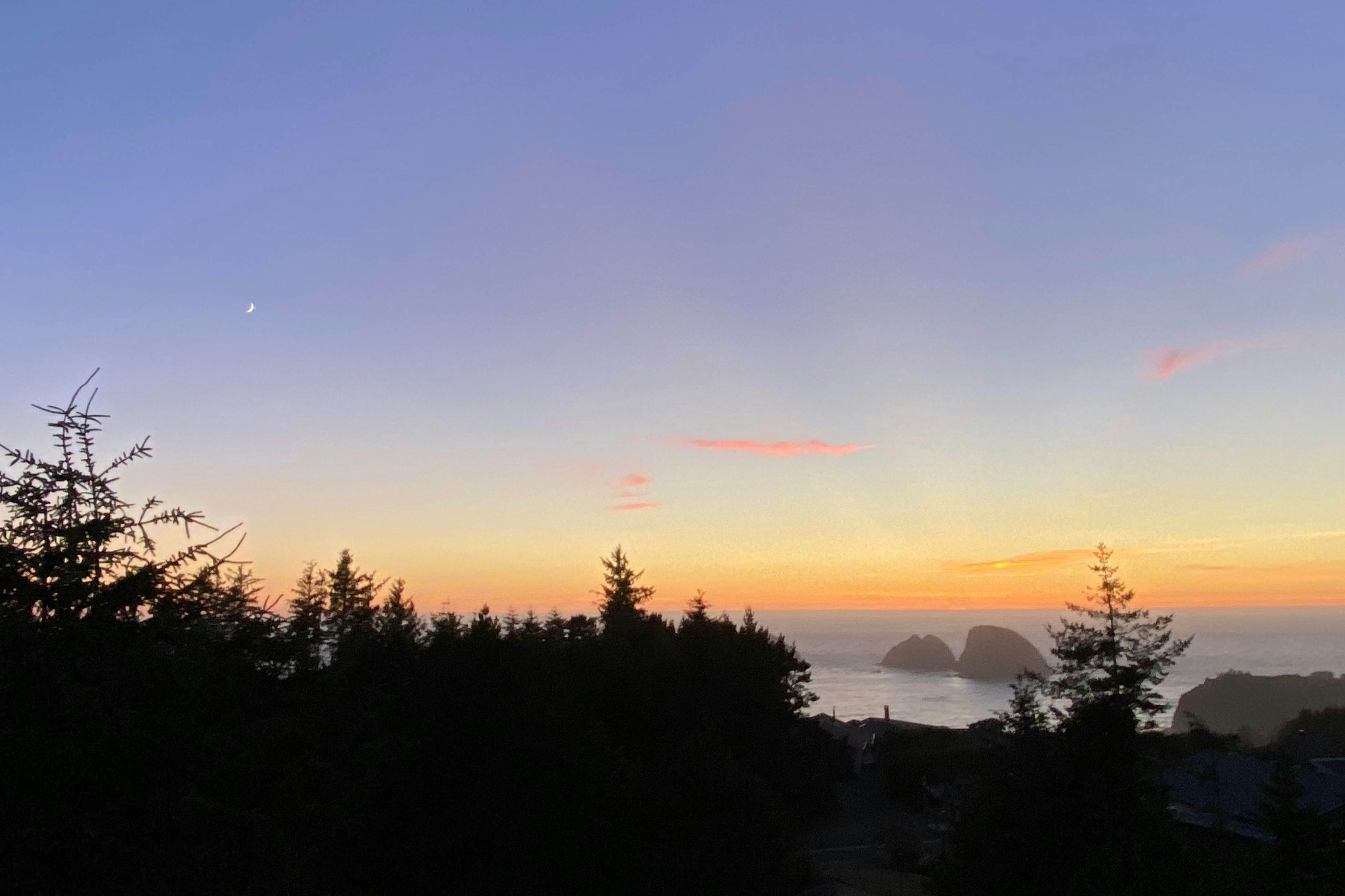 Dog-friendly home with ocean views, deck, washer/dryer, grill, & fireplace